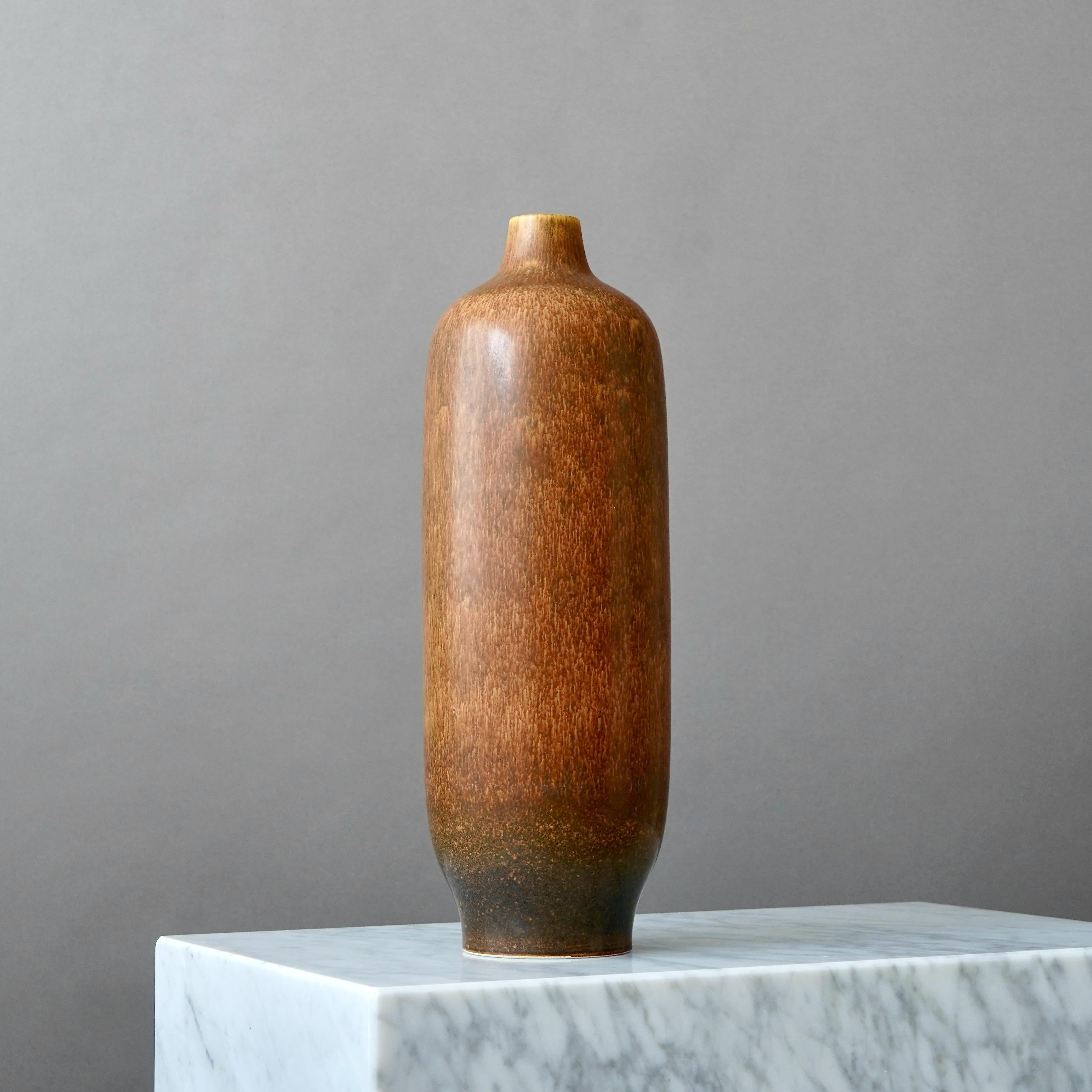 A large and rare stoneware vase with amazing glaze.
Made by Carl-Harry Stålhane at Rörstrand Ateljé, Sweden, 1960s.

Great condition. 
Signed 'CHS' and makers mark 'R' with three crowns.

Carl-Harry Stålhane (1920-1990) is one of the most renowned