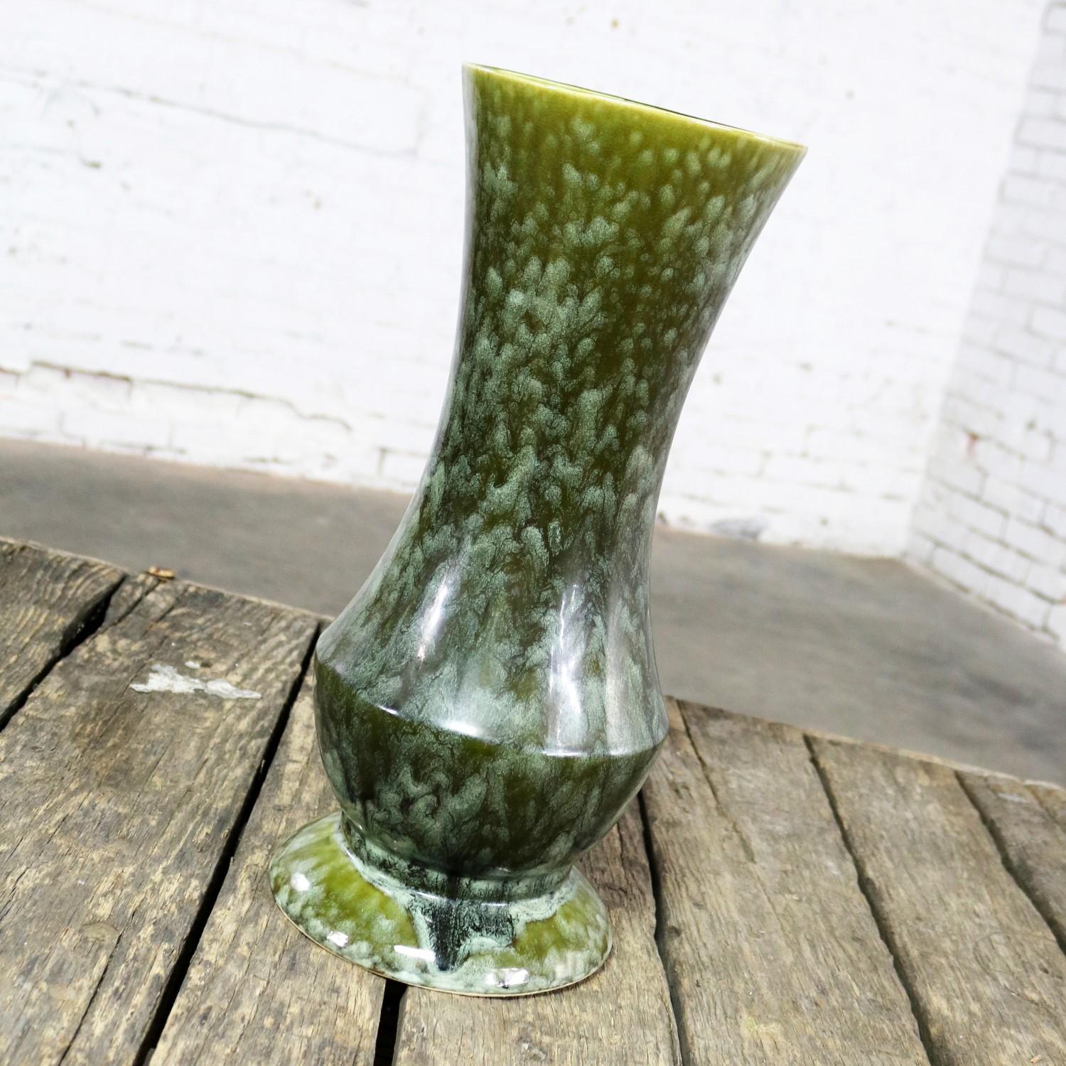 Handsome very large Brush McCoy USA vase number 177 in a green mottled glaze which may be their green onyx. It is in wonderful vintage condition. There are a couple glaze chips on the bottom and a couple fleabite glaze chips on the rim. There is