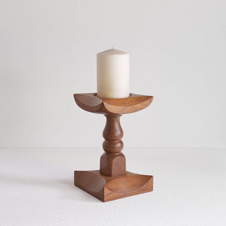 Brutalist candle holder in solid oak, mid-20th century.    Very graphical and sizable candle holder in a distinct brutalist style. Due to the size and shape, this candle holder will be a conversation piece on your sideboard or table. The use of