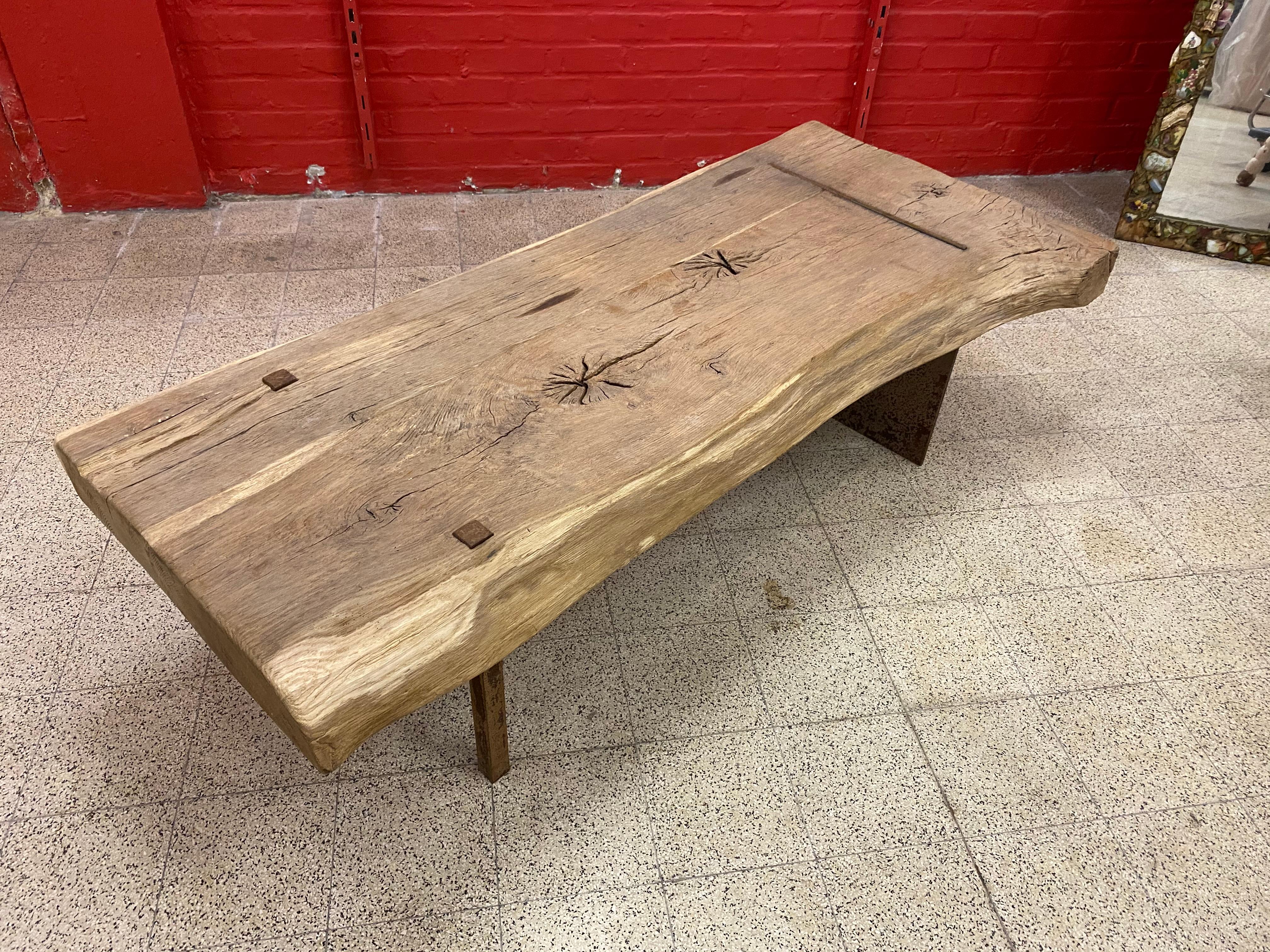 Large Brutalist coffee table in solid wood and iron, circa 1960.