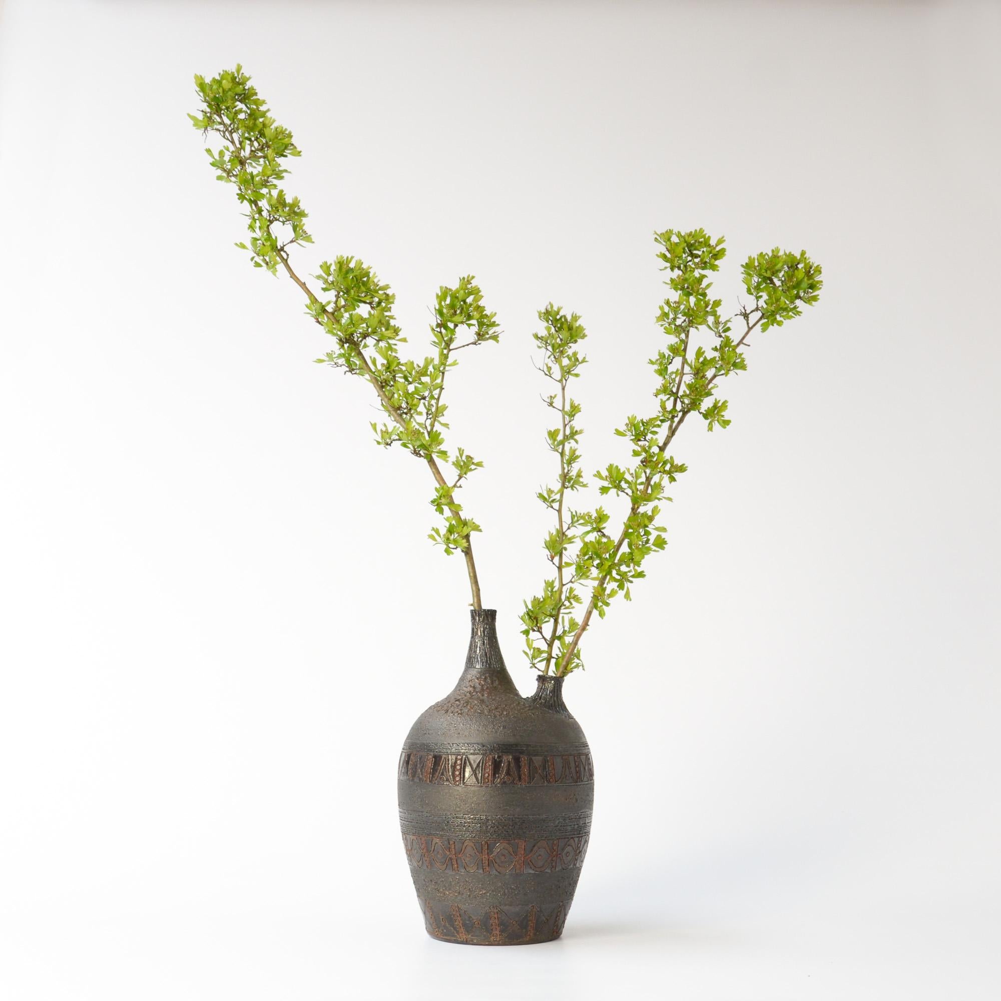 This impressive vase is created by Rogier Vandeweghe for Amphora. It can be dated circa 1965. The brutalist glaze and the shape are amazing. This pure vase is a unique piece in perfect condition.