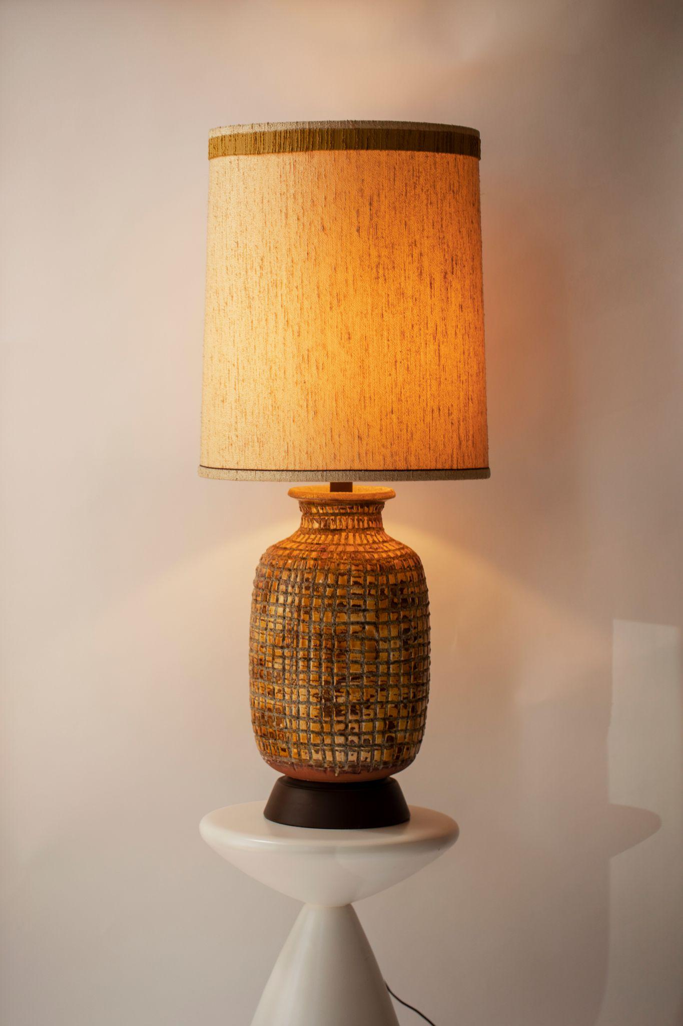 Large brutalist glazed terracotta lamp with original textured shade.

Dimensions listed are the overall dimensions of the lamp plus the shade, as pictured.