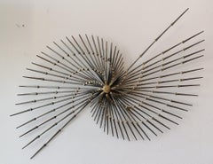 Large Brutalist iron & brass pinwheel sunburst Ron Schmidt wall sculpture 1970s