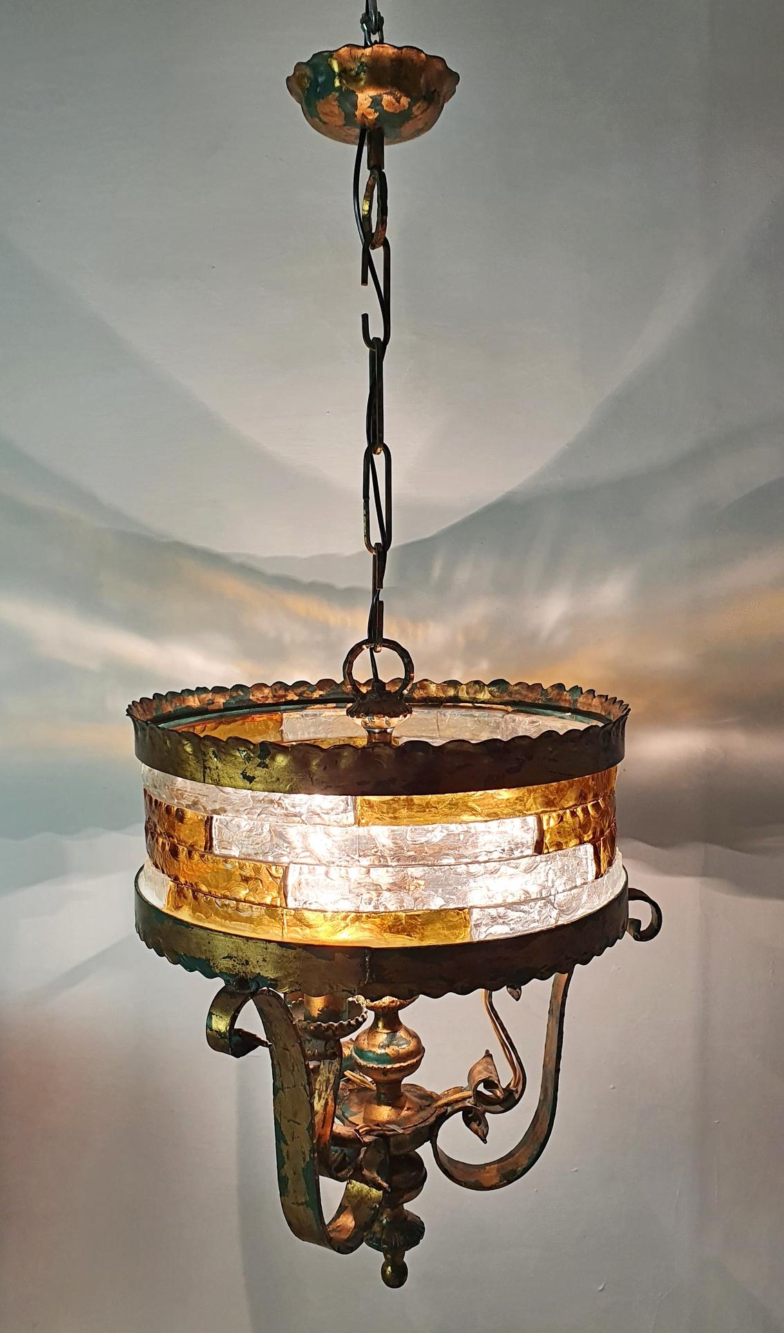 Rare Brutalist style ceiling lamp attributed to Italian manufacturer Longobard in iron and colored glass. In good working condition. There are some small older cracks on a few pieces of glass but nothing that minimizes the overall impressions of the