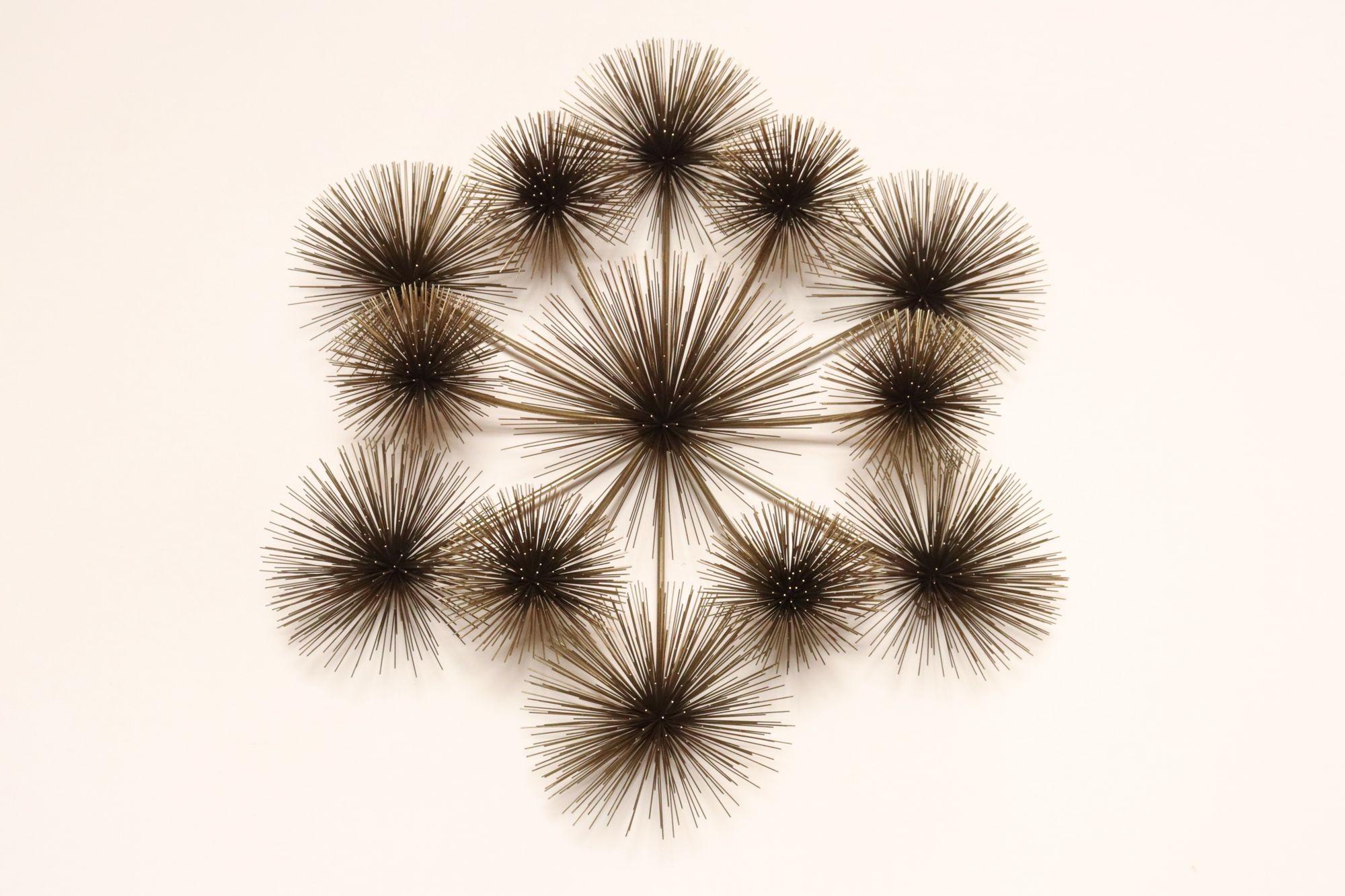 Impressive Modernist brass 'Pom Pom' / 'Sea Urchin' wall sculpture by Curtis Jere for Artisan House (1979, USA).
Striking, extra large wall art composed of thirteen individual pom pom/sea urchin forms connected by tubular brass rods.
Very good,