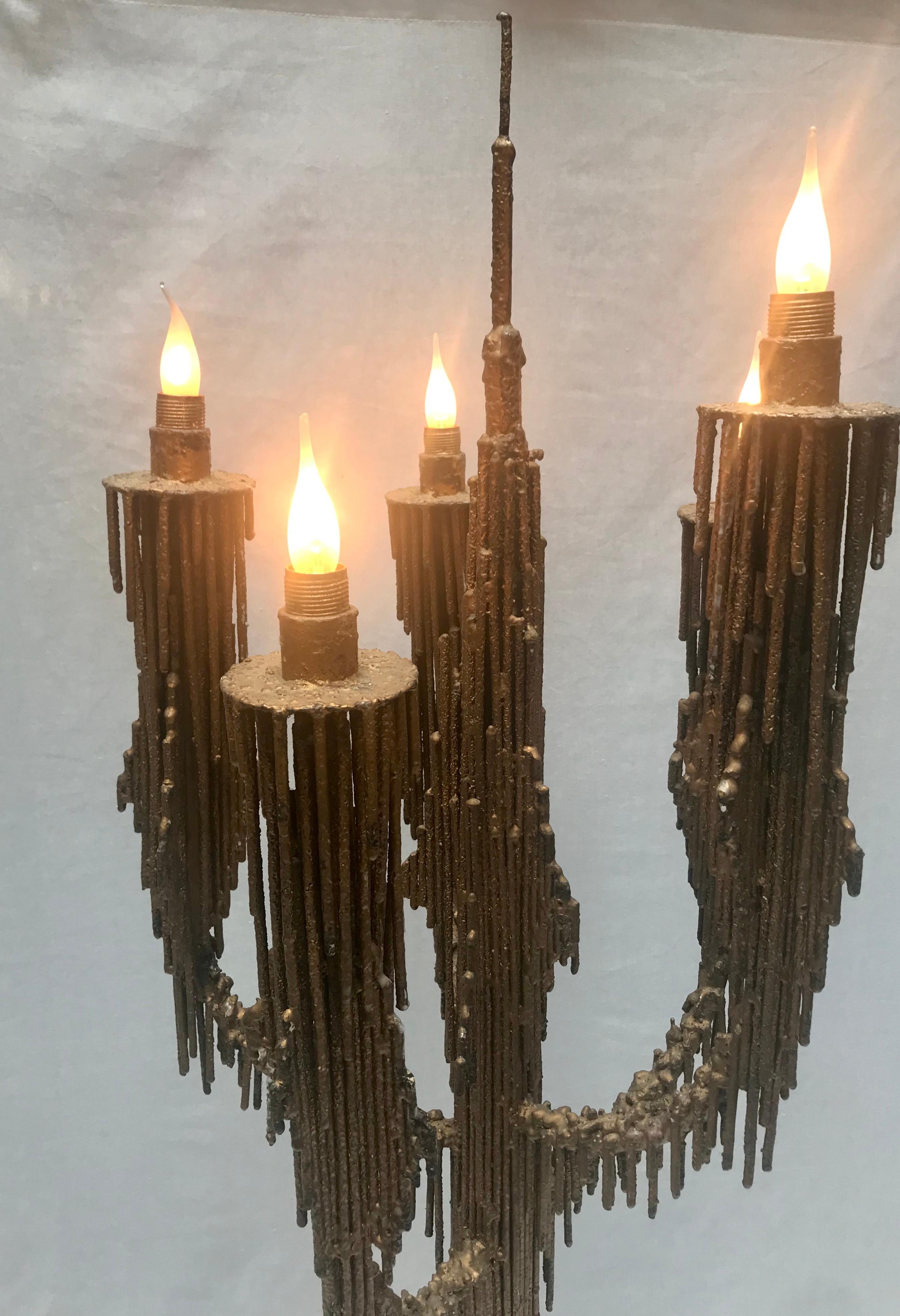 Large Brutalist standing candlestick with light bulbs.
5 branches with golden patina.

 