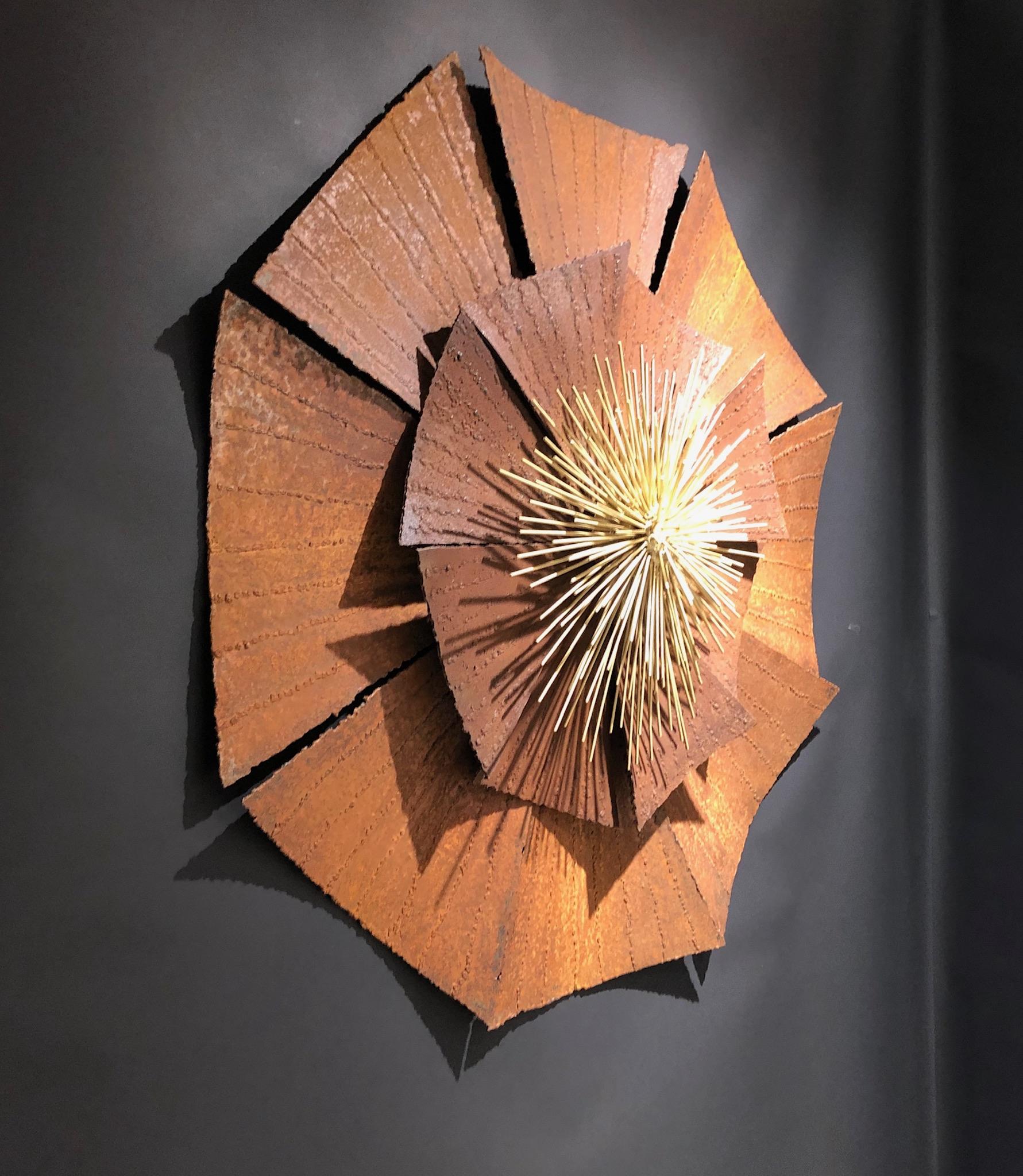 A spectacular large Brutalist steel flower sculpture from the 1970s.
The petals are rusted steel and the center is gilded steel. Sculptor is unknown.
Dimension: 40” high, 40” wide, 7” deep.