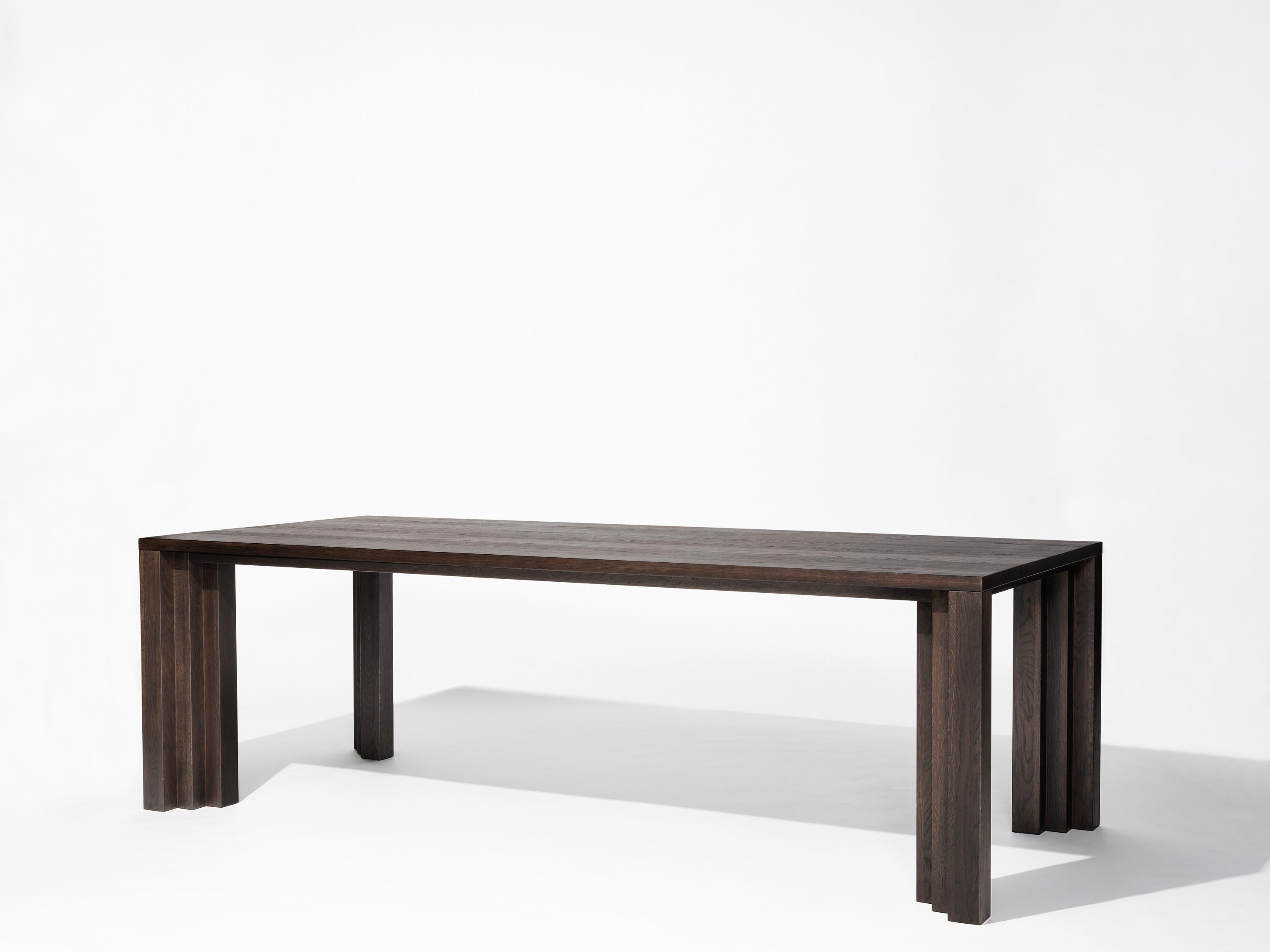 The Cadence table is inspired by the simplicity and power of the rhythmic stepped brickwork visible in the architecture of Amsterdam's 'South Plan' area; the city development plan designed by H.P. Berlage in 1915. A flow of rhythmic volumes and
