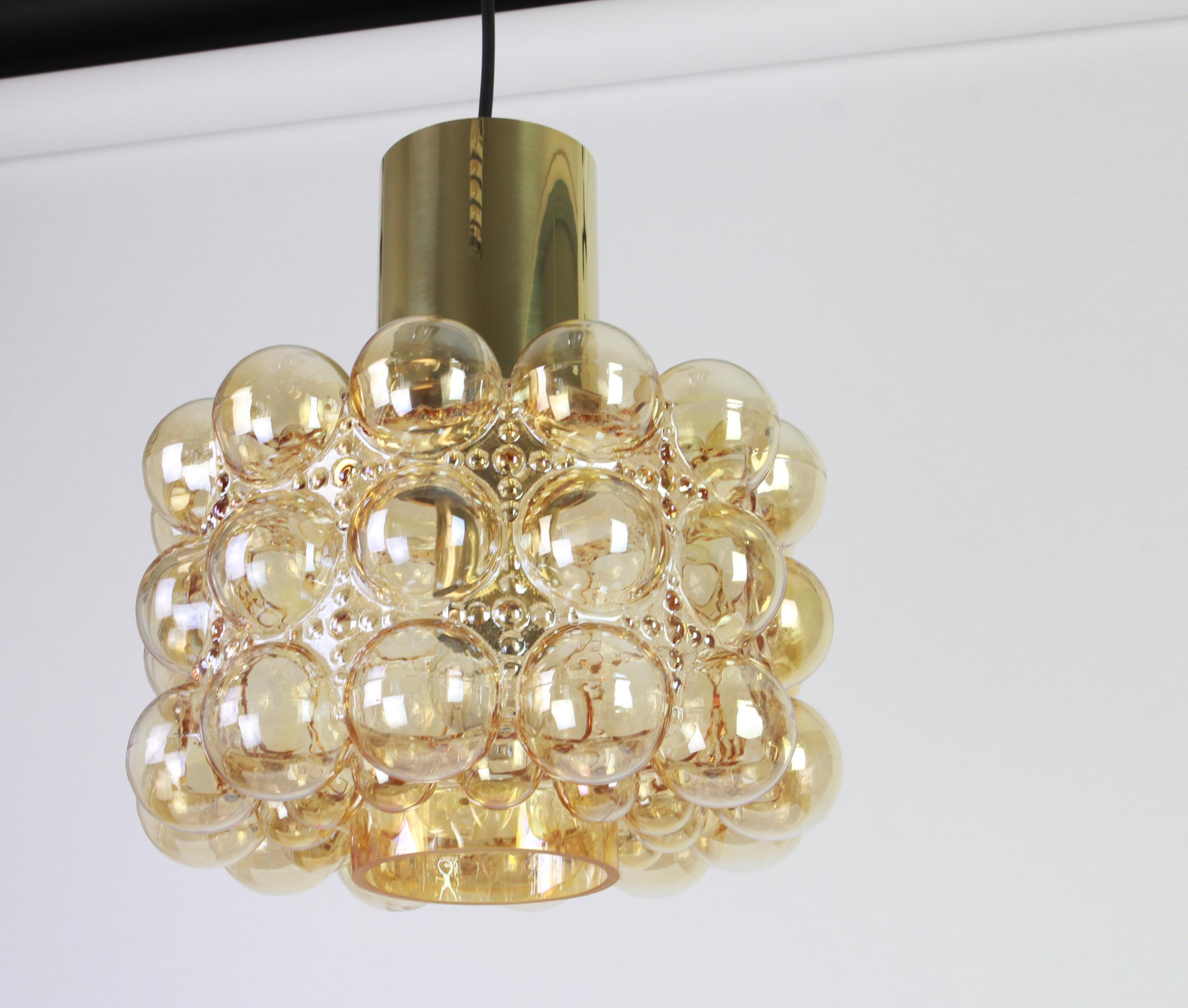 A large round bubble glass pendant designed by Helena Tynell for Limburg, manufactured in Germany, circa 1970s.

Sockets: Needs 1 x E27 standard bulb with 100W max each.
Light bulbs are not included. It is possible to install this fixture in all
