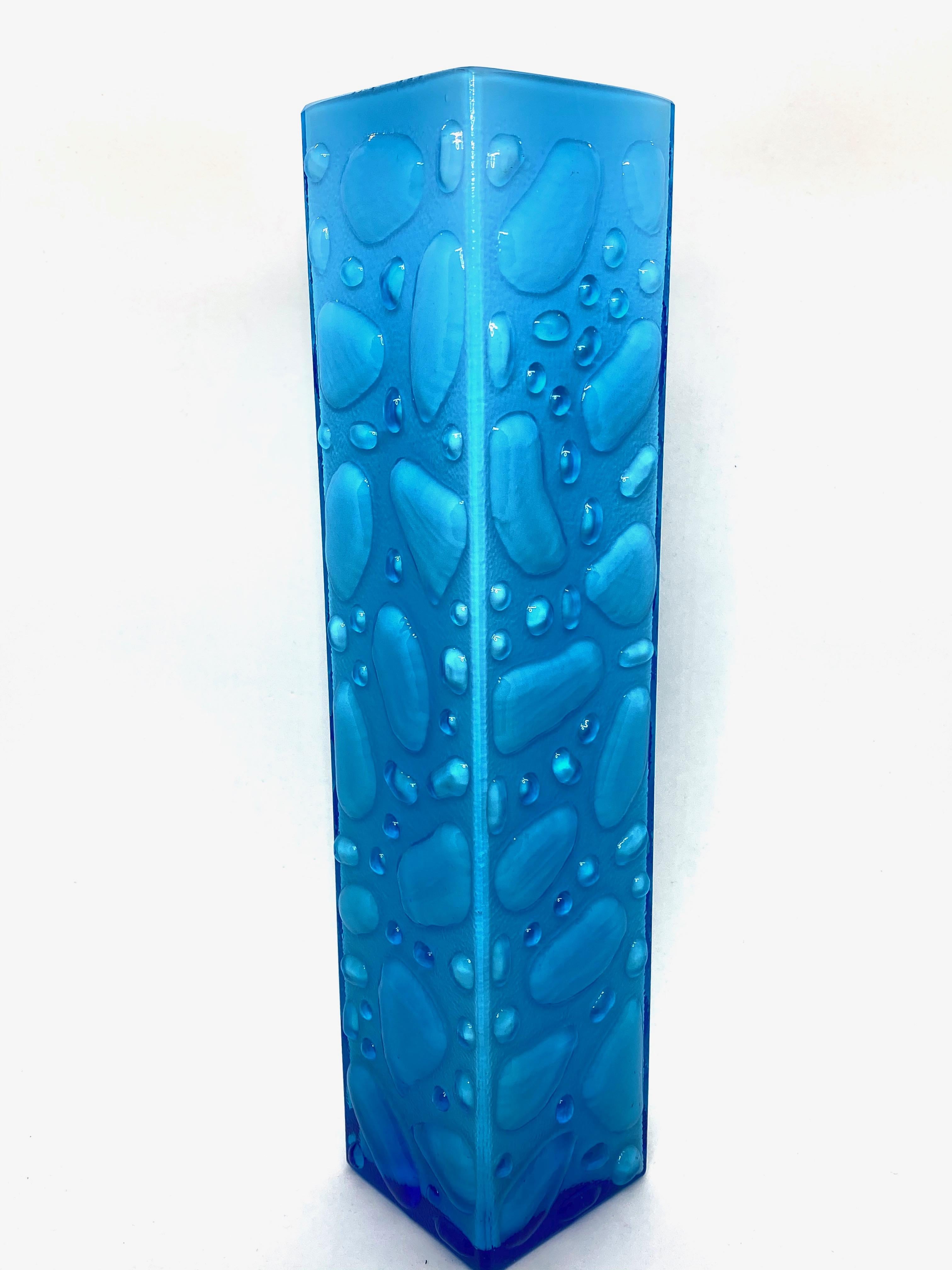 Wonderful Mid-Century Modern German vase by Gral Glas, attributed to be designed by Emil Funke, circa 1970. This beautiful turquoise or light blue colored and clear vases brings a touch of fun and fantasy to any room. A nice addition to any room.