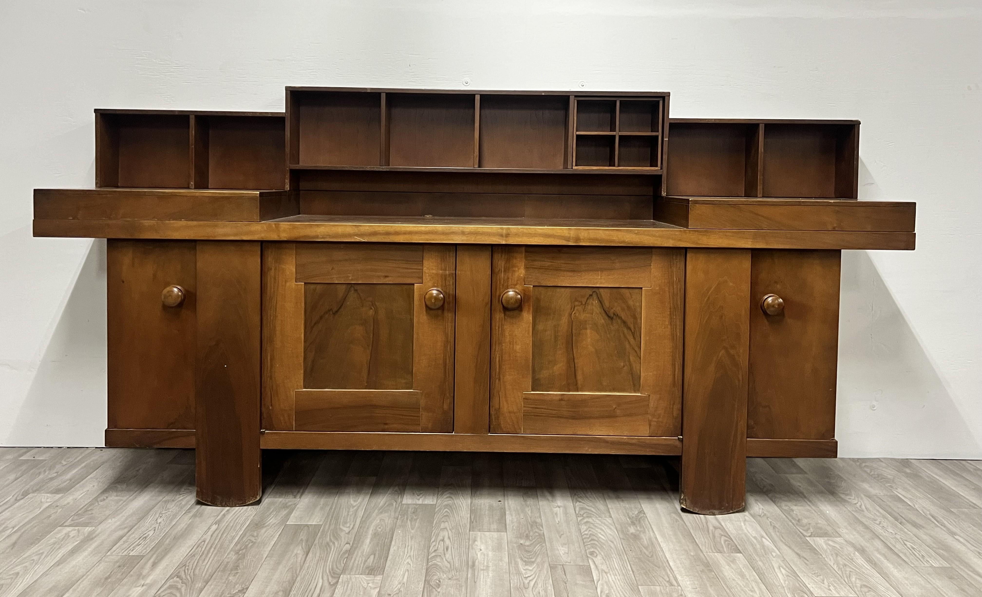 Mid Century Modern Italian Buffet Cabinet by Silvio Coppola for Bernini
The cabinet can be used with or without the top display
Features plenty of storage
In need of minor refinishing
Matching dining table available sold separately 