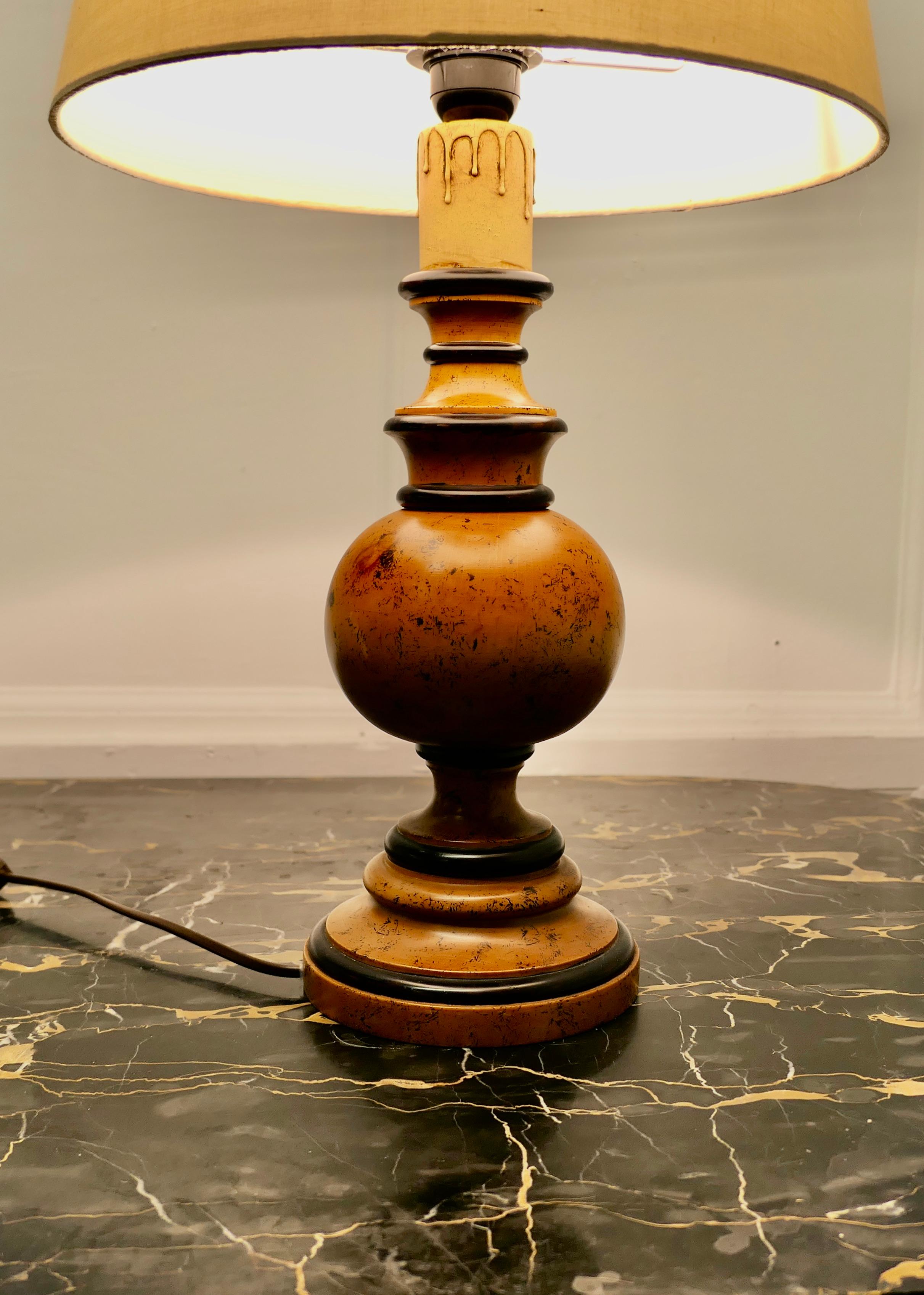 Large bulbous turned wood table lamp.

This is a chunky piece it has been turned in wood.
This is a very attractive piece it in good condition for its age, I have shown it with a shade this can be included if required.
In good aged condition,