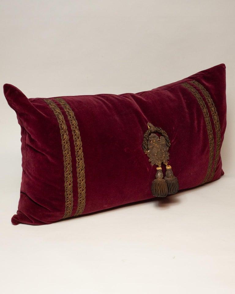 Italian Large Burgundy Velvet Ottoman Pillow with Antique Metallic Trim & Tassels For Sale