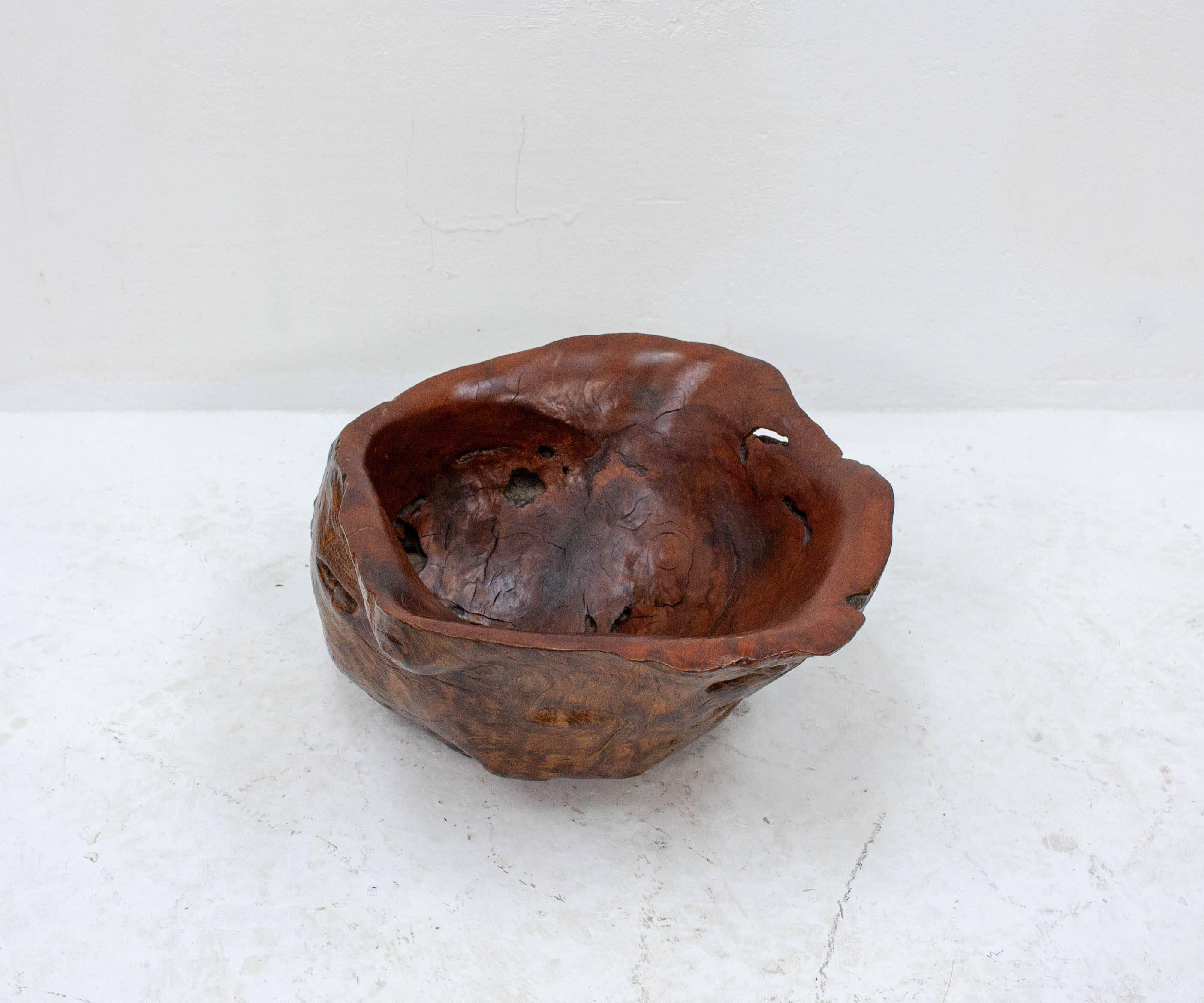 Decorative burl walnut bowl. Quite a chunky example, this bowl is roughly the diameter of an inflatable beach ball and weighs 9 kilograms. Very eye-catching.