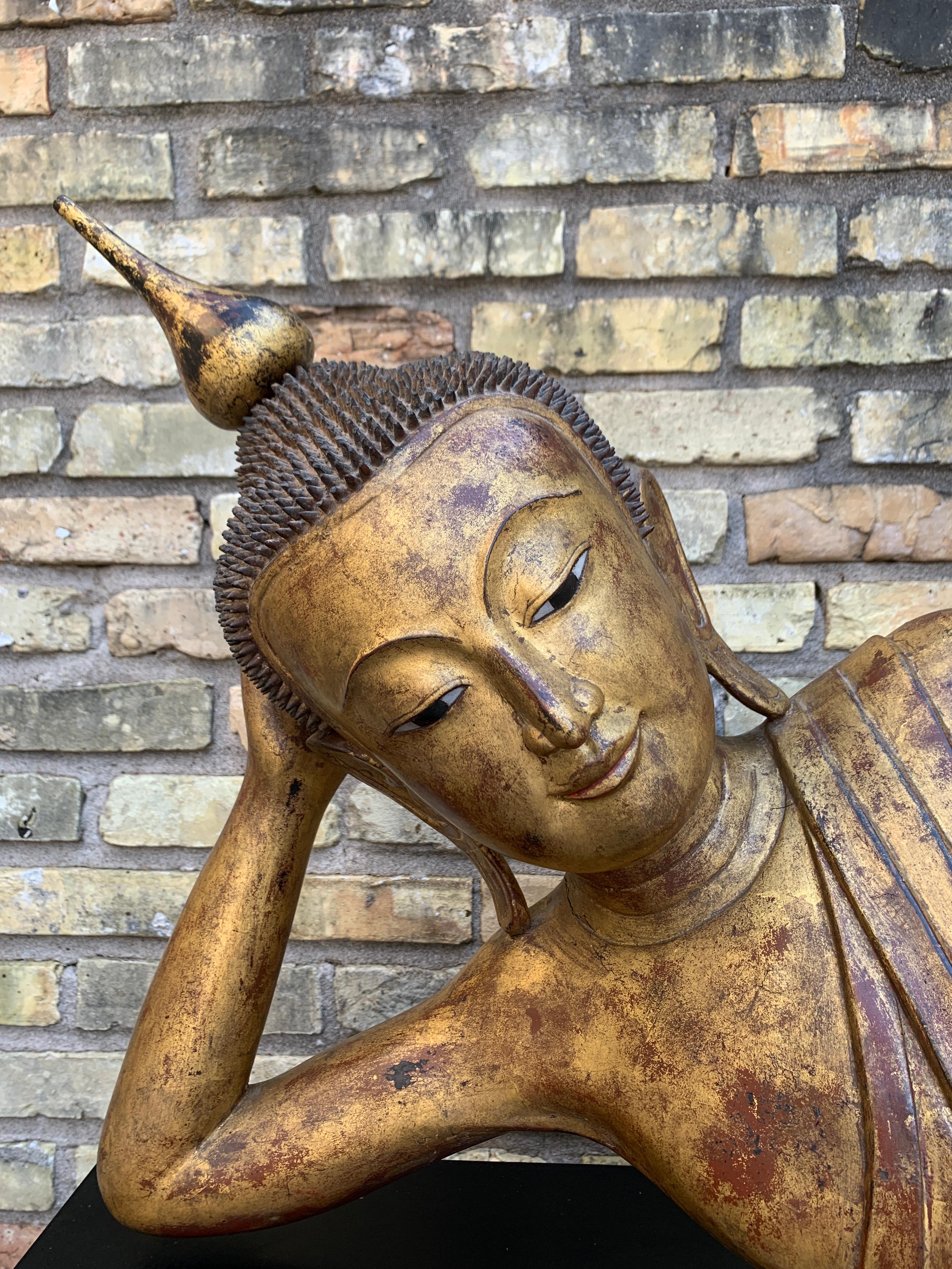 Large Burmese Gilt Teak Reclining Buddha, Early 20th Century In Good Condition In Austin, TX