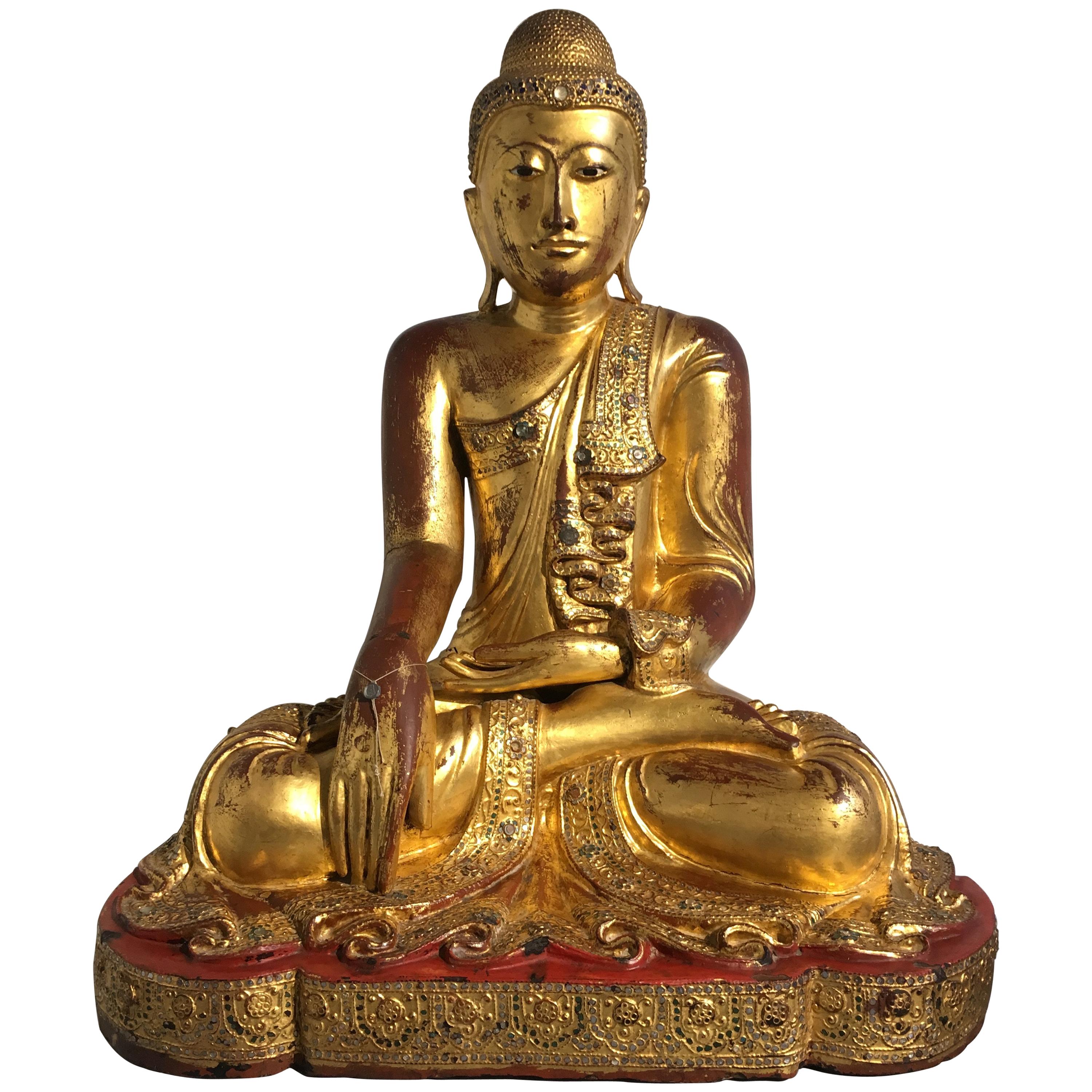 Large Burmese Mandalay Period Carved, Lacquered and Gilt Teak Buddha, circa 1900