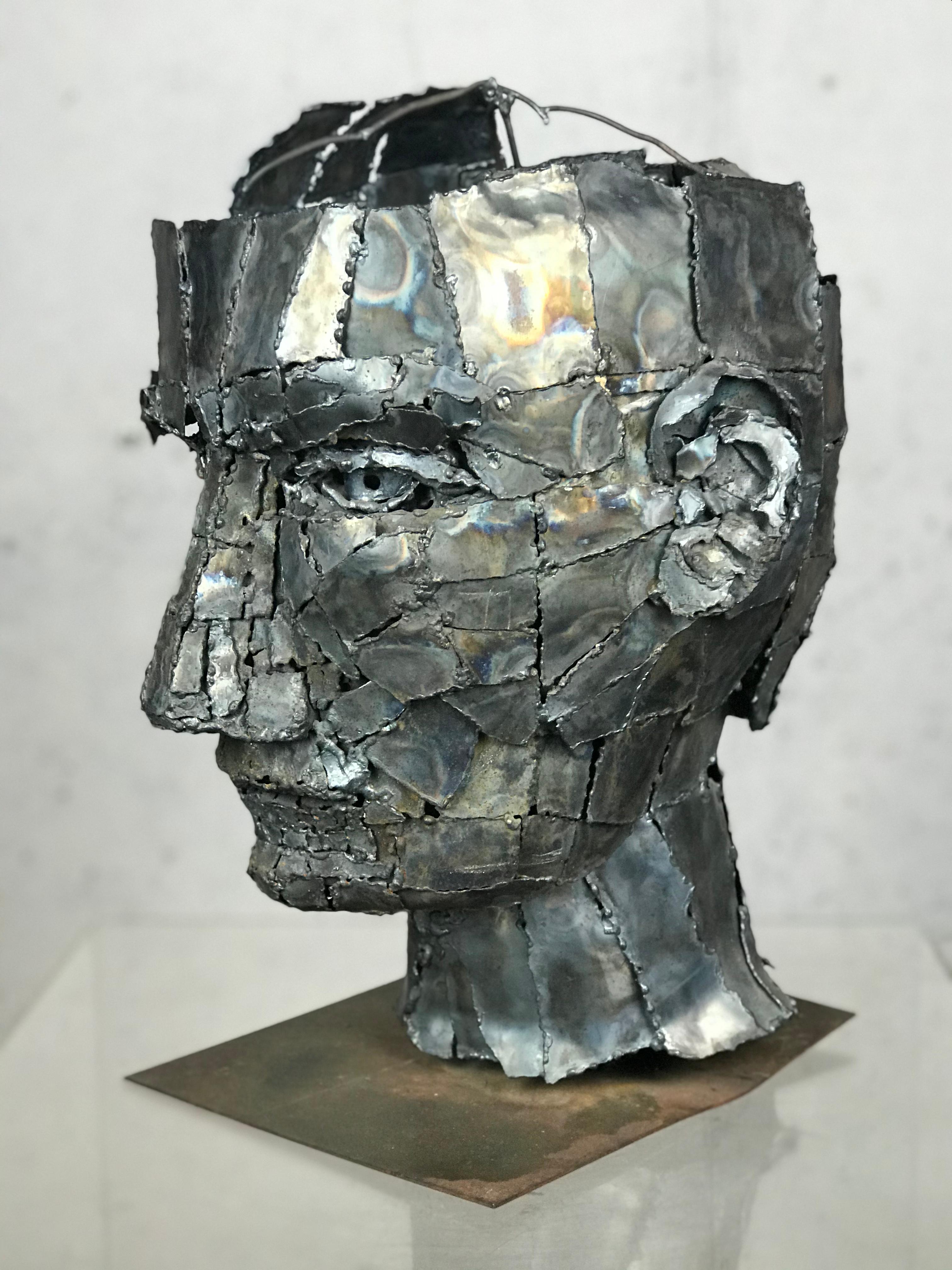 metal head sculpture