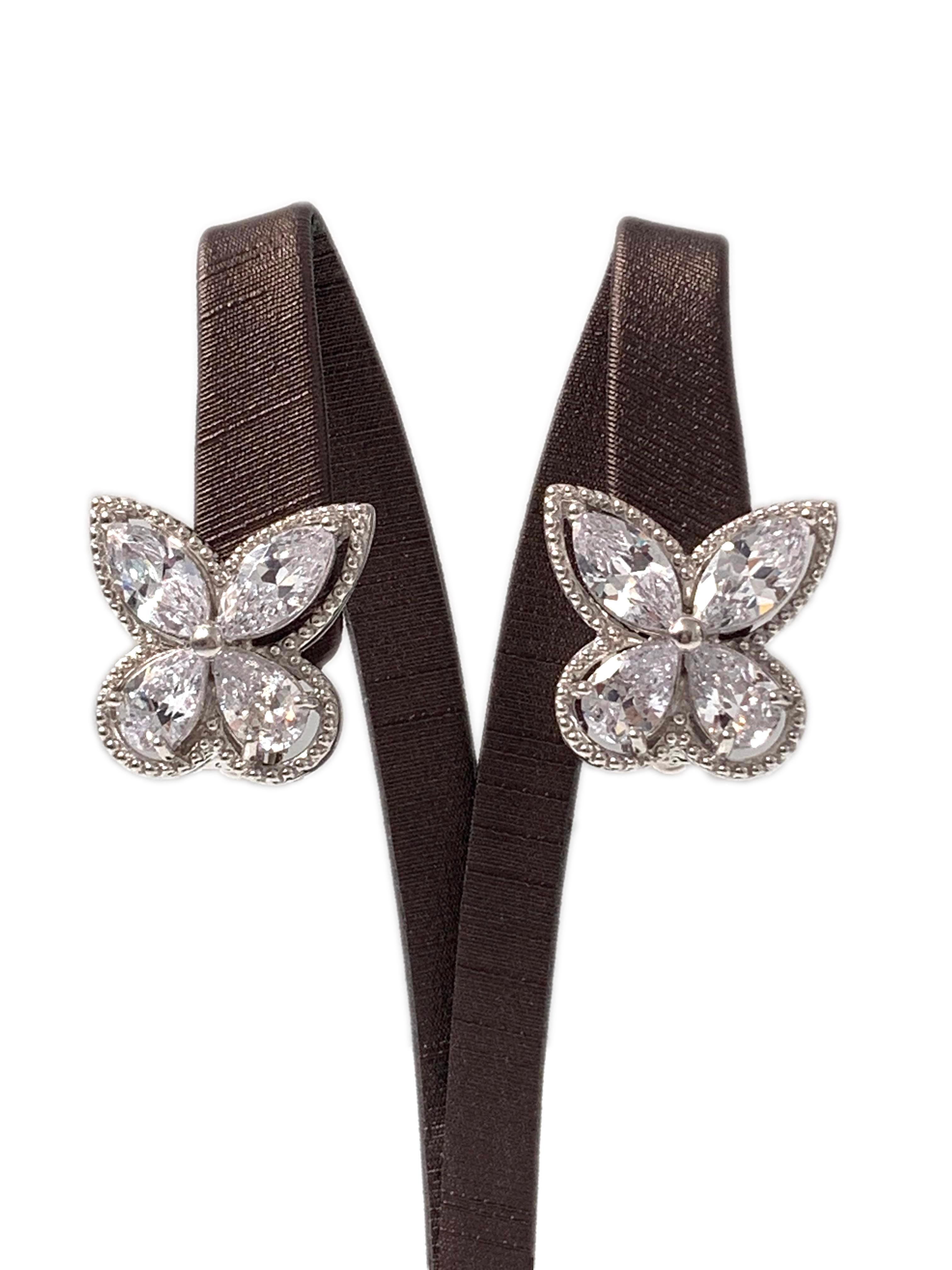 Fabulous Large Butterfly Faux Diamond CZ Clip-on Earrings

These earrings feature top quality marquis and pear shape cubic zirconia, handset in platinum rhodium plated sterling silver, and adorned with beaded trim. The earrings measure approximately