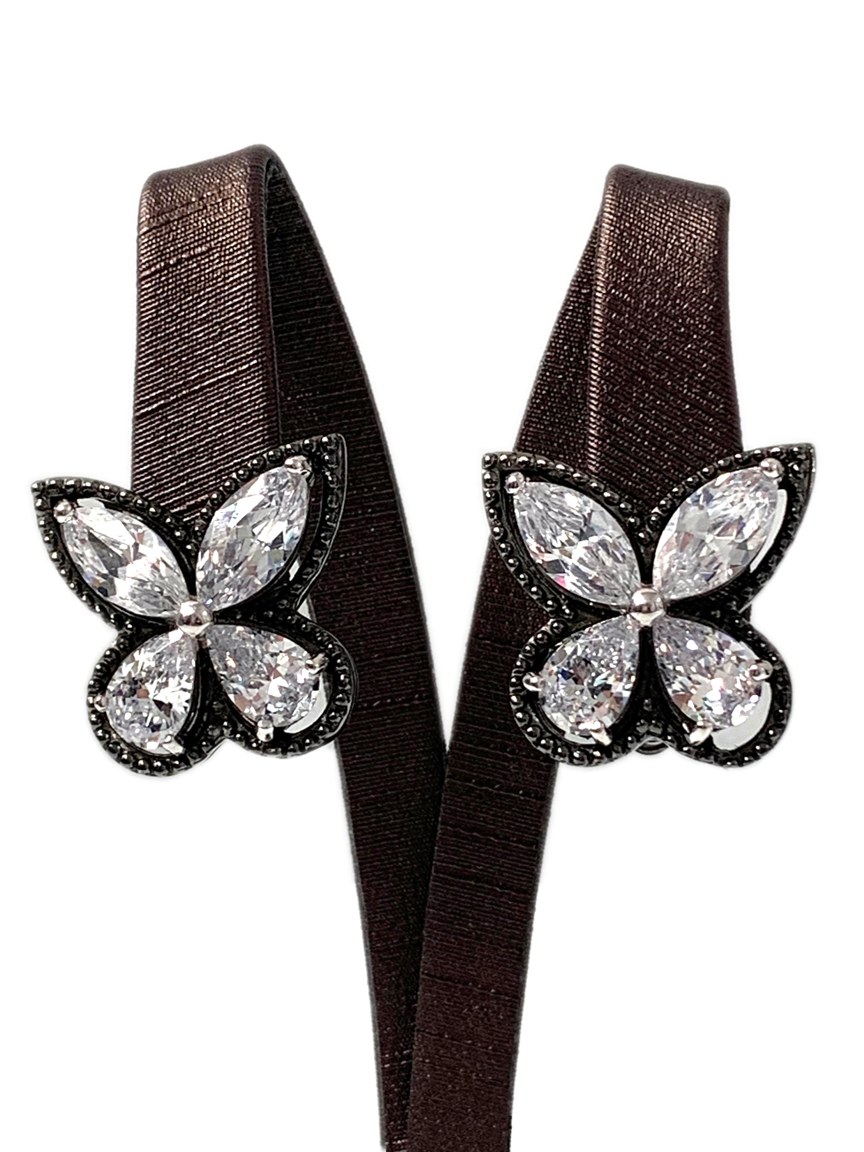 Fabulous Large Butterfly Faux Diamond CZ Clip-on Earrings

These earrings feature top quality marquis and pear shape cubic zirconia, handset in black rhodium plated sterling silver, and adorned with beaded trim. The earrings measure approximately