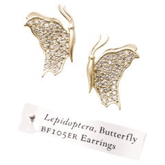 Boucles d'oreilles papillon en or jaune 14 carats / vue latérale