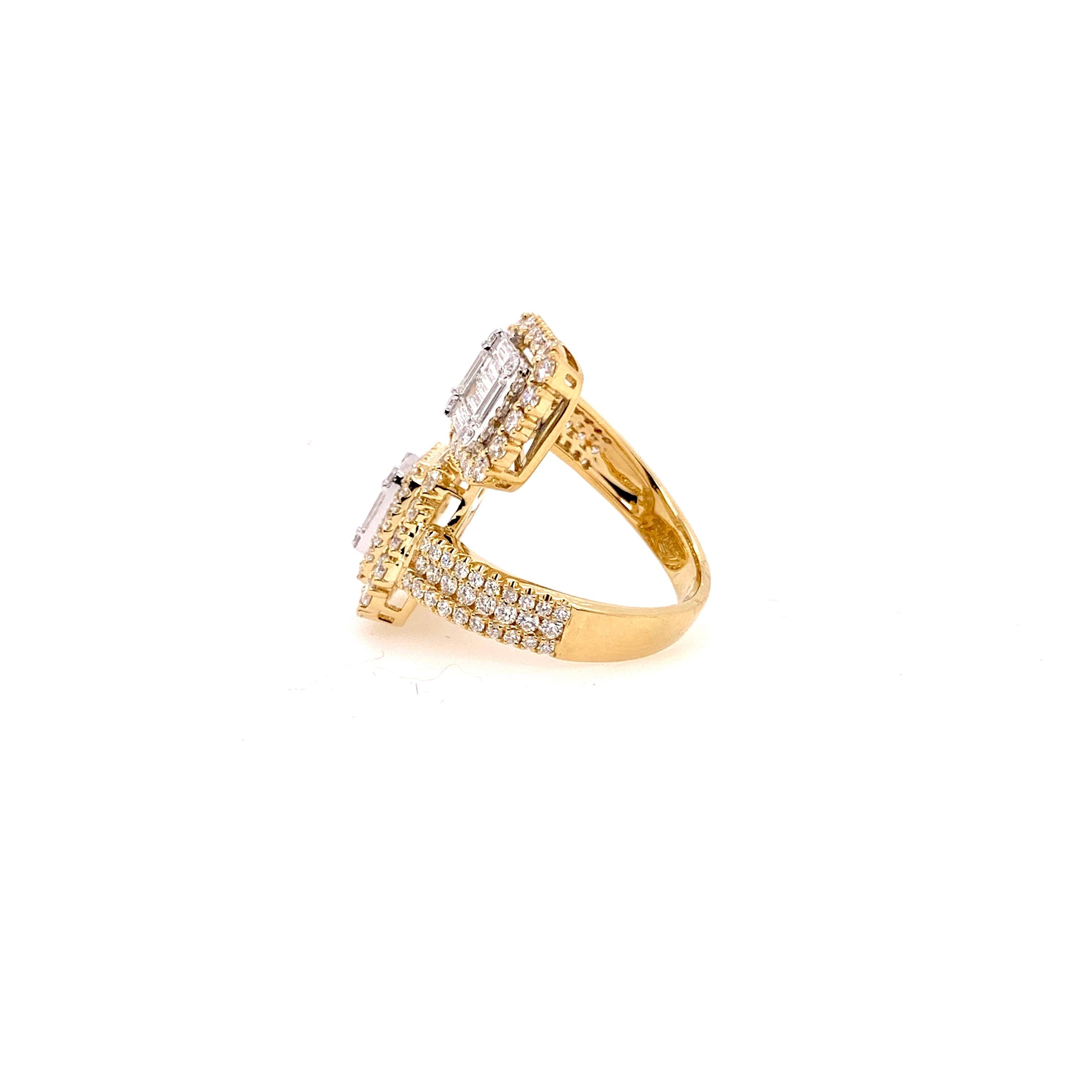 An unusual diamond bypass ring that will captivate everyone's attention.   Uniquely made in 18k yellow gold, it has a total of 3.55 cts of round diamonds and diamond baguettes.  This statement piece will be thoroughly enjoyed in any jewelry