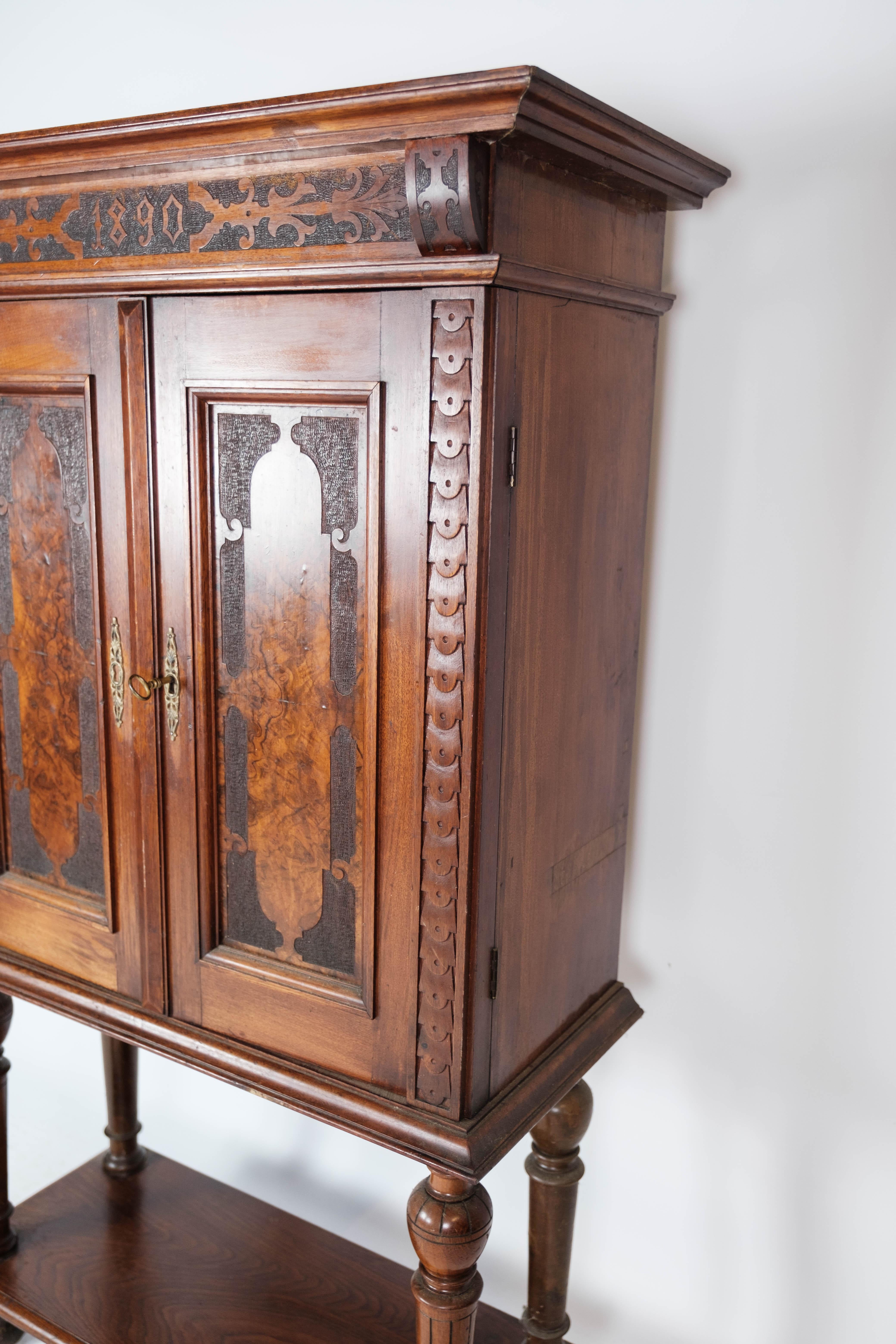 Danish Large Cabinet of Mahogany and Walnut Decorated with Carvings, 1860s