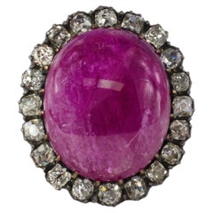 Large Cabochon Ruby and Old Mine Diamond Halo Ring