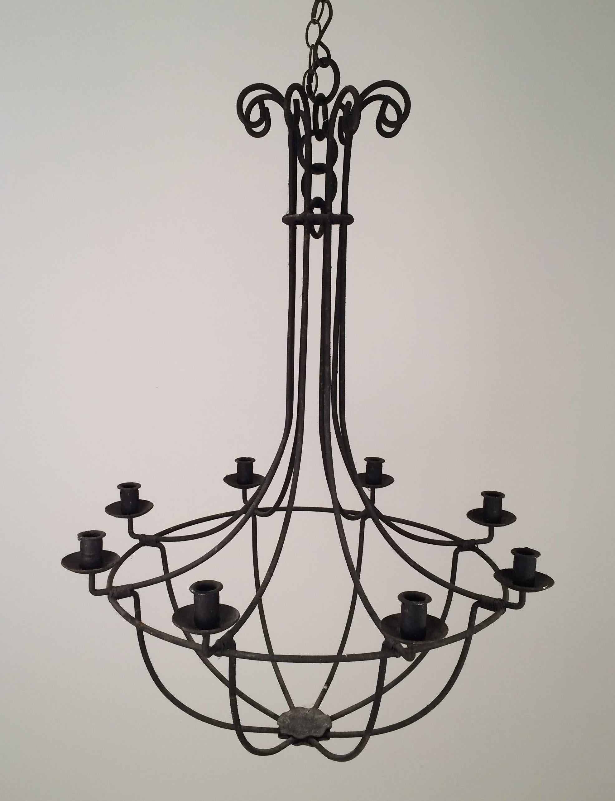 This large cage chandelier is made of wrought iron. This is a French fixture made circa 1970.