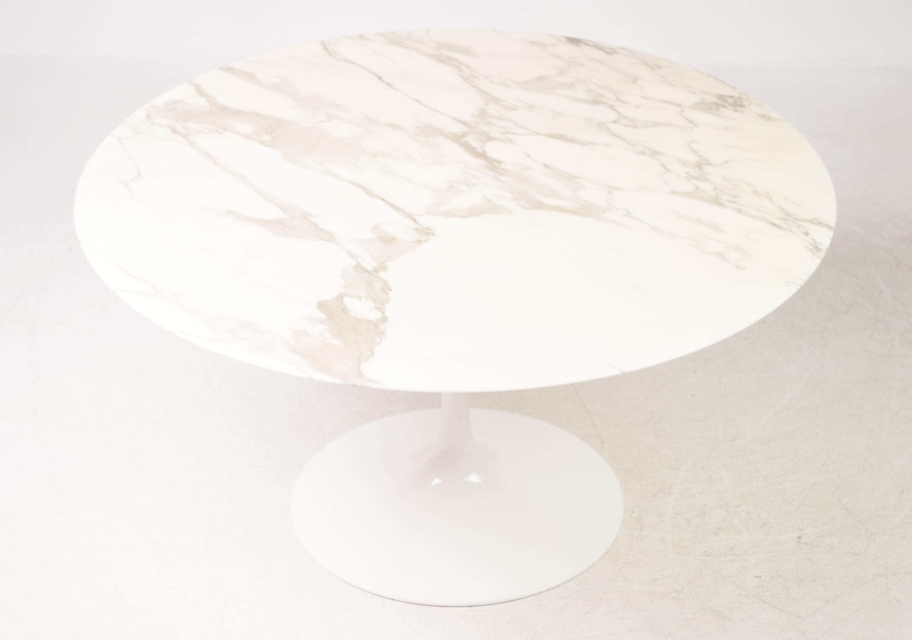 Classic tulip dining table designed by Eero Saarinen for Knoll International in the most desirable Calacatta marble.
A defining accomplishment of modern design and a timeless addition to your home—a true Classic.
Logo embossed in pedestal bottom.