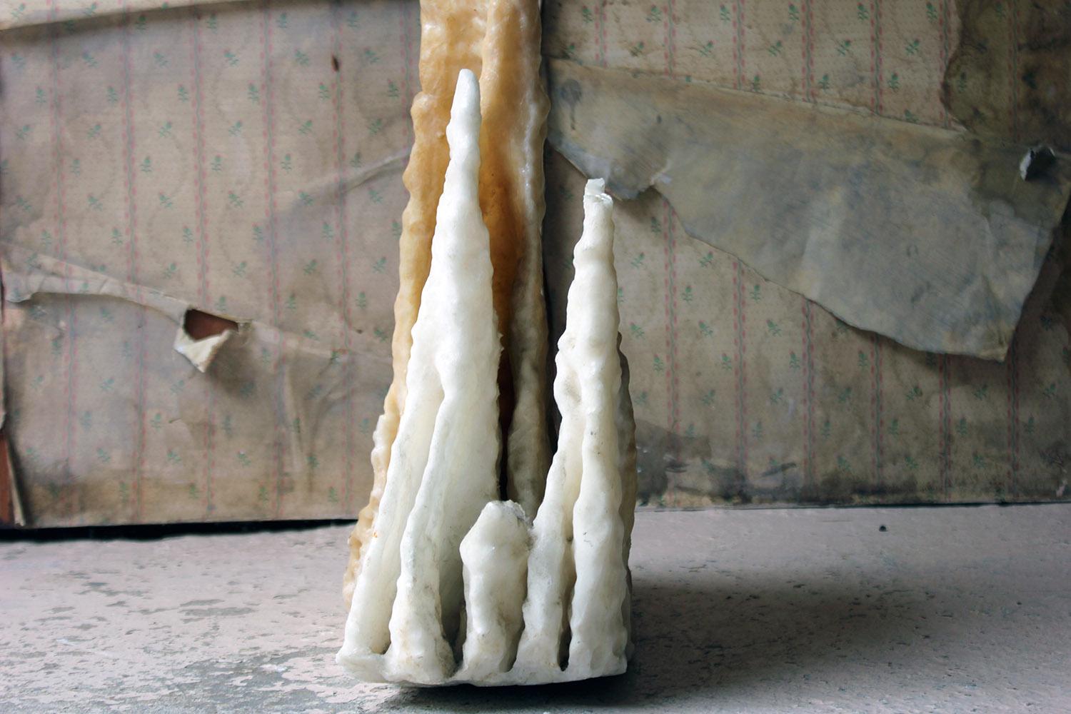 The sculptural and attractively formed cave formation specimen standing at three feet tall in milky white calcite deposits showing attractive formations formed over thousands of years; the tall central spike with two smaller forms to the side.

In