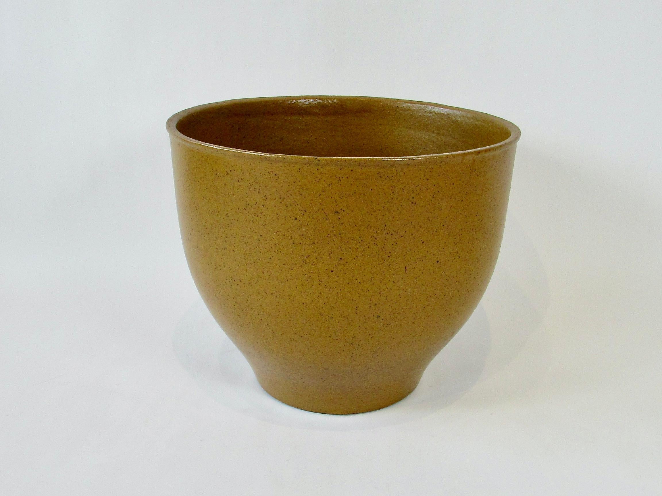 To me Architectural Pottery is one of the mid century companies that helps to define California modern aesthetic . This David Cressey pot is a fine example of that work . The largest and cleanest I have ever seen in person . Greenish tint glaze no