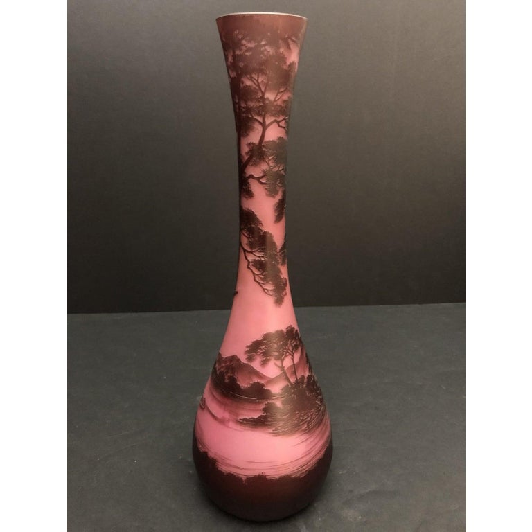 Large pink and burgundy cameo glass vase signed Richard. Beautiful Art Nouveau large Cameo made by the Loetz factory glass vase Signed Richard.
Beautiful art glass vase featuring image of castle with river and trees.
Signed 