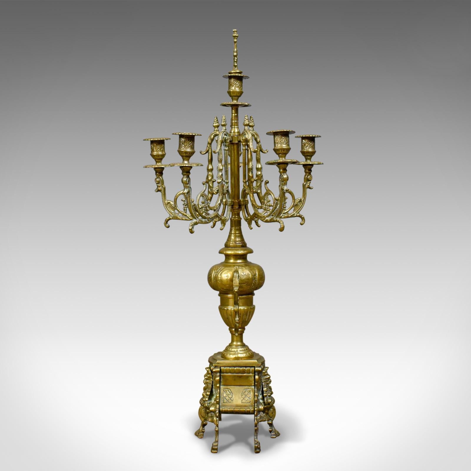 This is a large candelabra, a 19th century, French, brass gilt table centrepiece dating to circa 1900.

Substantial and magnificent gilt brass candelabra
Offering five elaborately scrolled branches
And a sixth to the top featuring an alternative