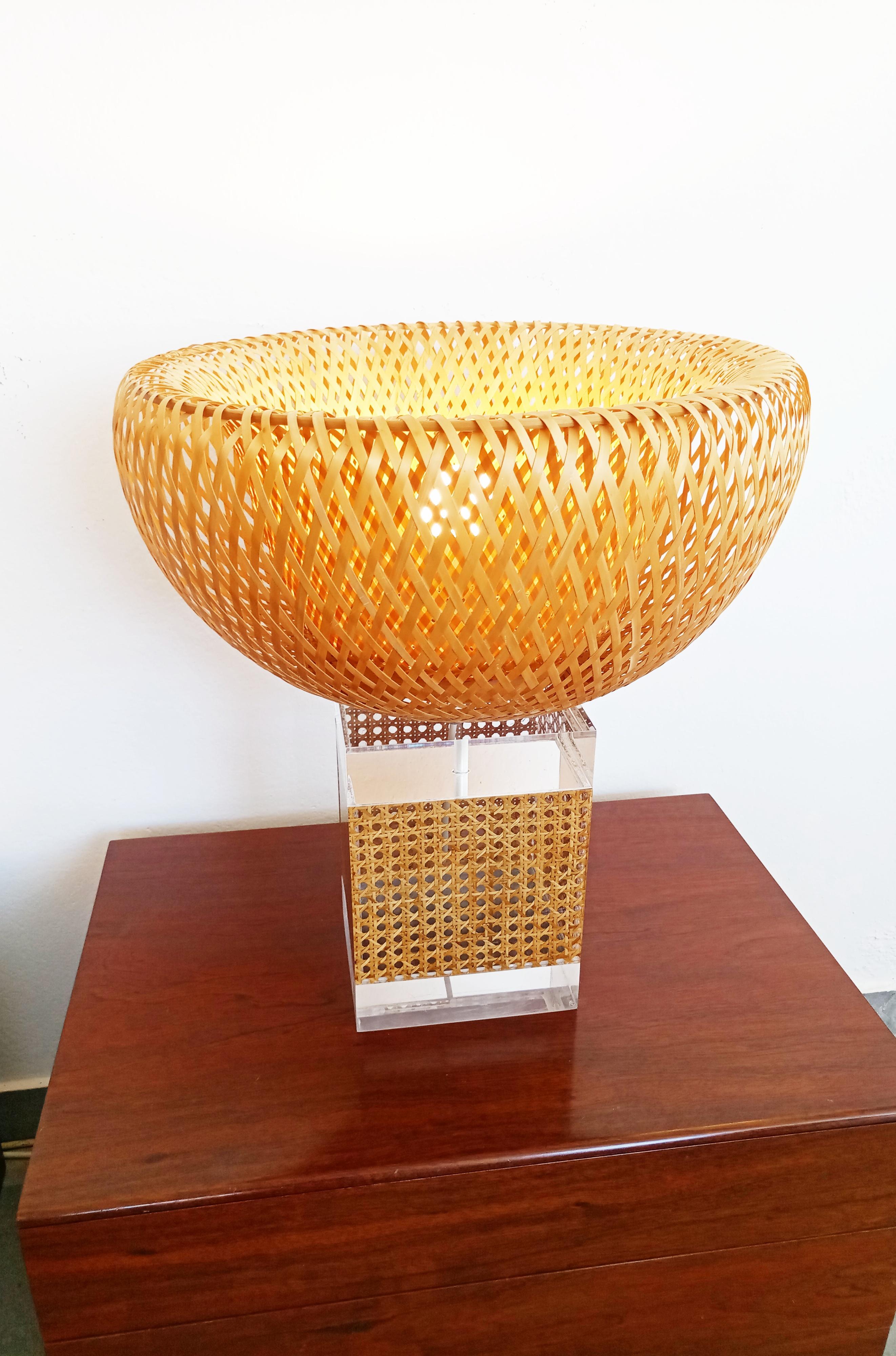 Exceptional large caning and Lucite table lamp manufactured in France in 1970s. In perfect vintage condition.