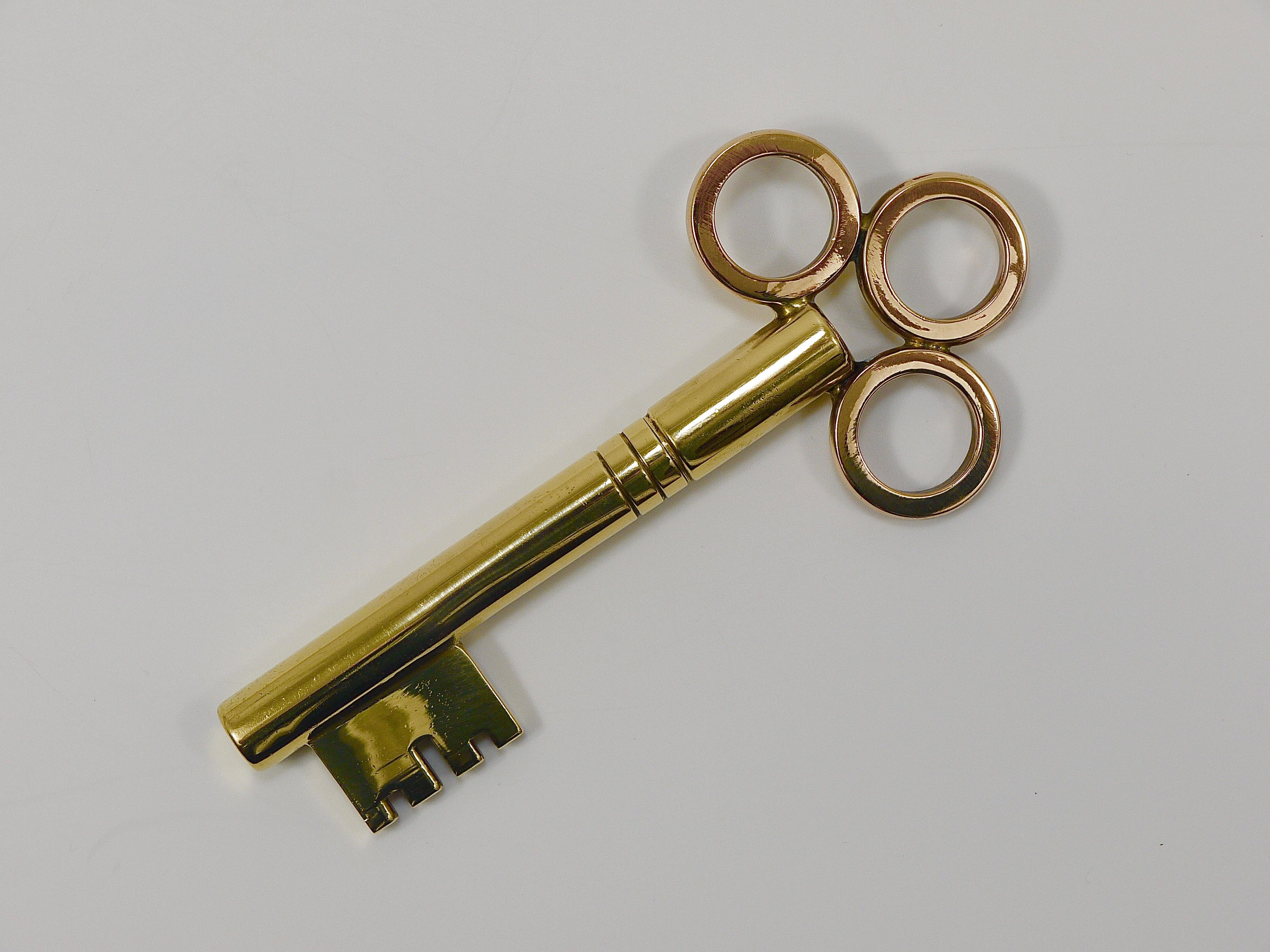 Austrian Large Carl Aubock Brass Key Corkscrew Bottle Opener Paperweight, Austria, 1950s For Sale