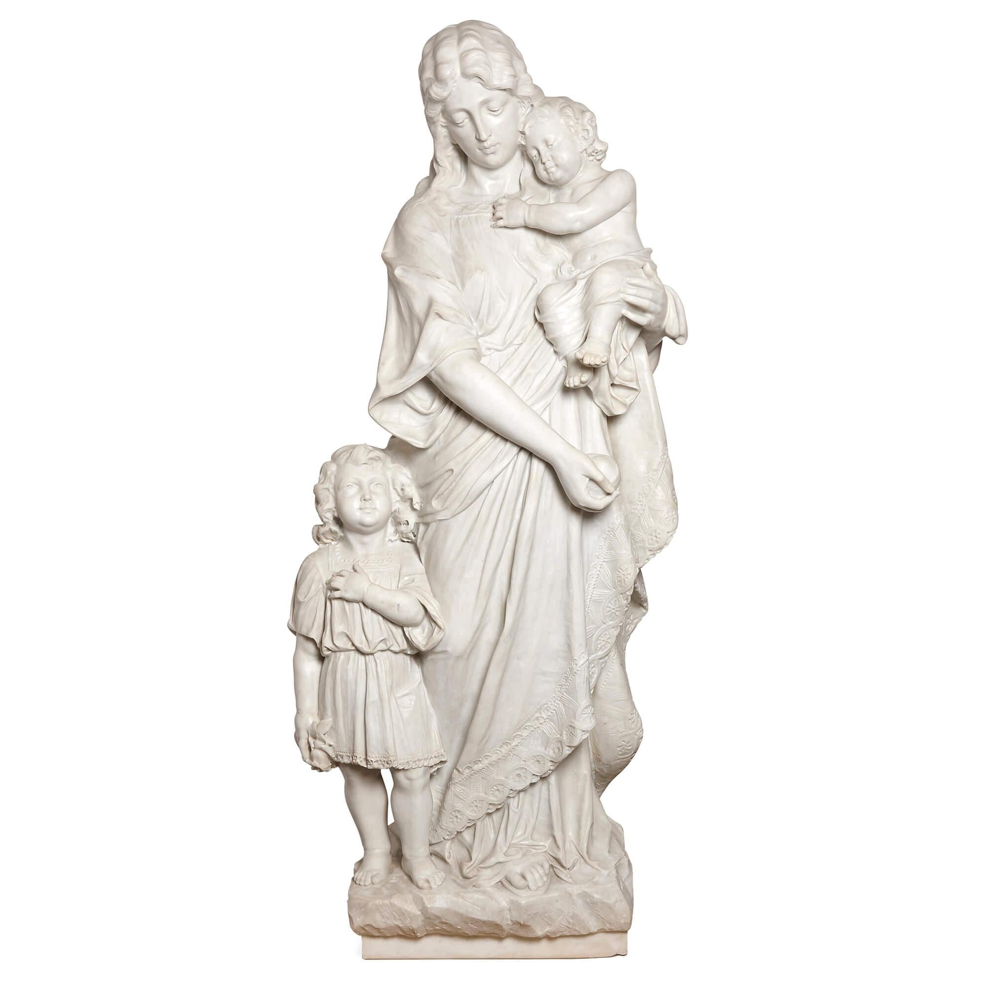 Néoclassique Grand groupe en marbre de Carrare reprsentant une Vierge, un enfant et le Baptiste, sign P. Romanelli en vente