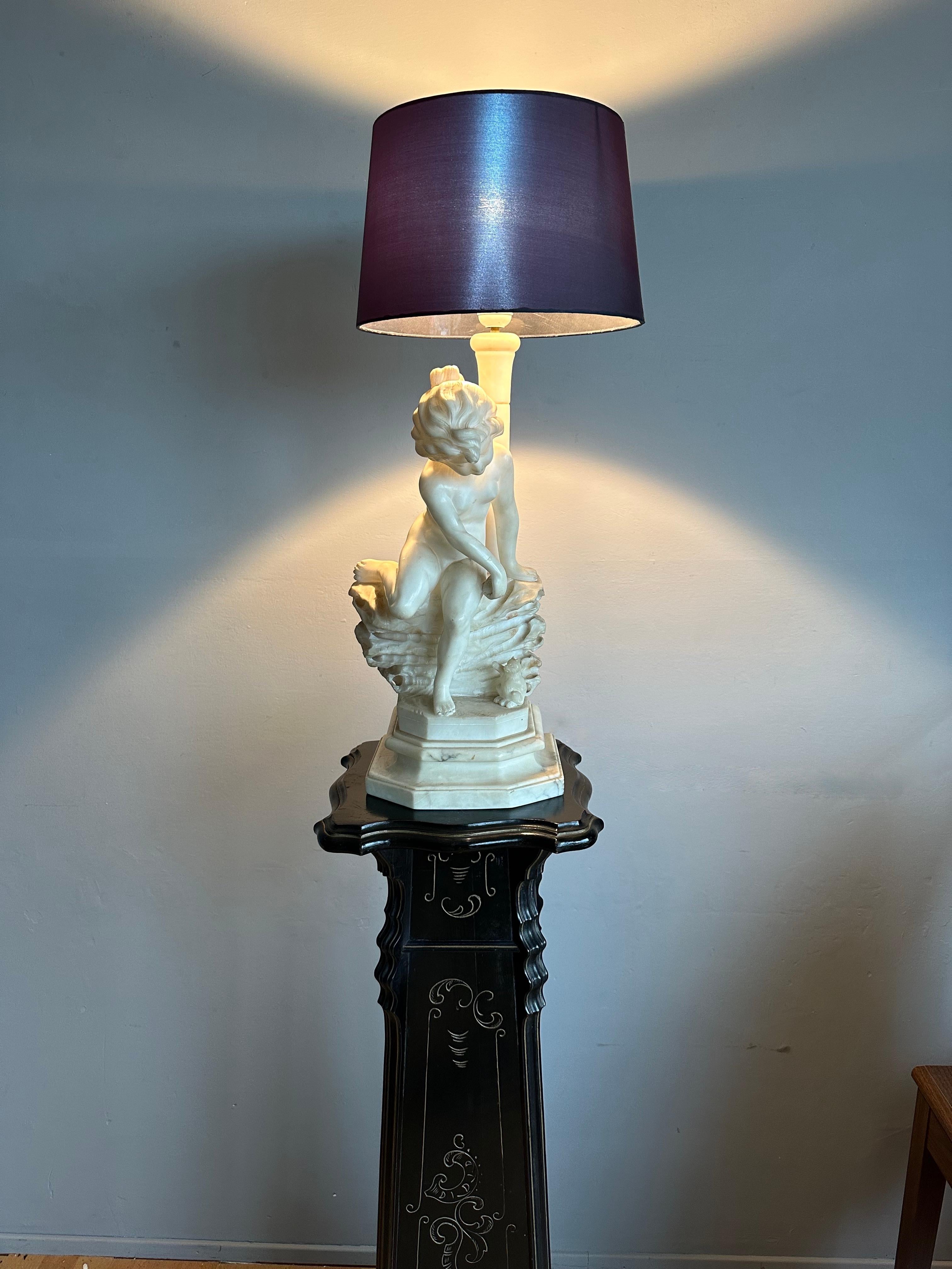 Handcarved, endearing and remarkable work of art.

If you are a collector of rare and good quality antiques then this wonderful alabaster sculpture table lamp could be perfect for your collection. Even if you don't necessary like antiques then you