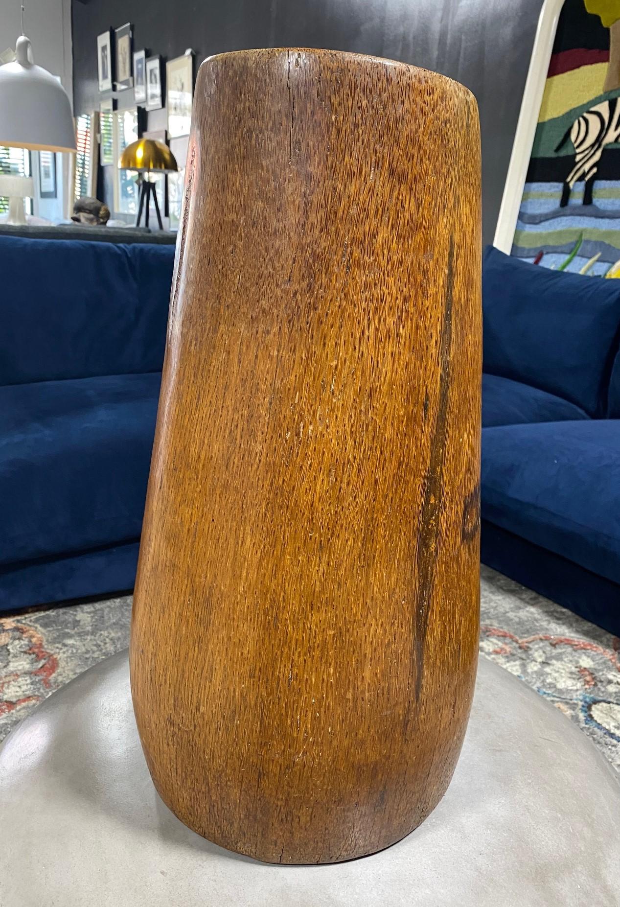 A truly spectacular one of a kind work - a large, quite heavy hand carved natural wood (perhaps a massive root) or bamboo standing vase. The piece has a very organic and sculptural look to it - Wabi-Sabi (the Japanese aesthetic of beauty that