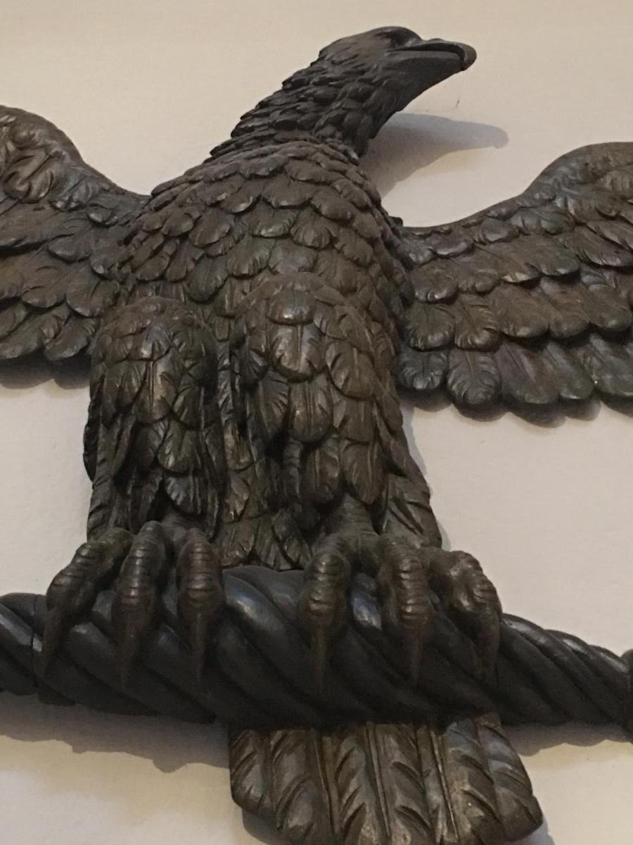 A large carved eagle in oak and beechwood. Empire period
France.

 