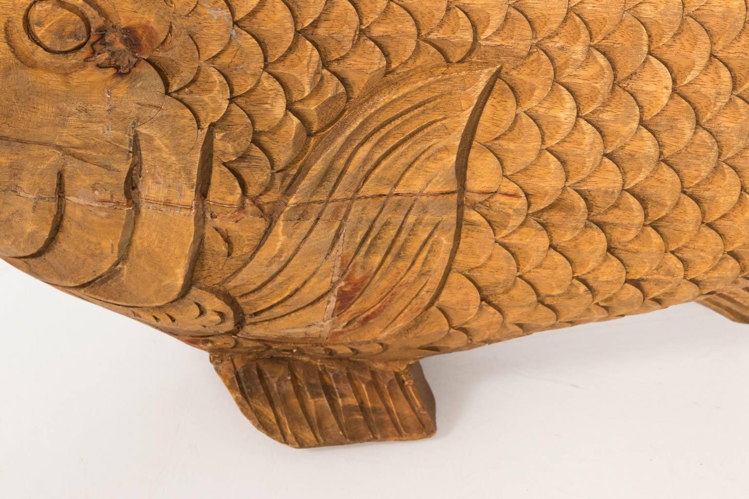Hand-carved wooden fish with fish scale detail, circa 1970.
 