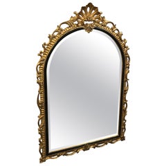 Large Carved and Gilded Shell Topped Dauphine Mirror by Harrison & Gil