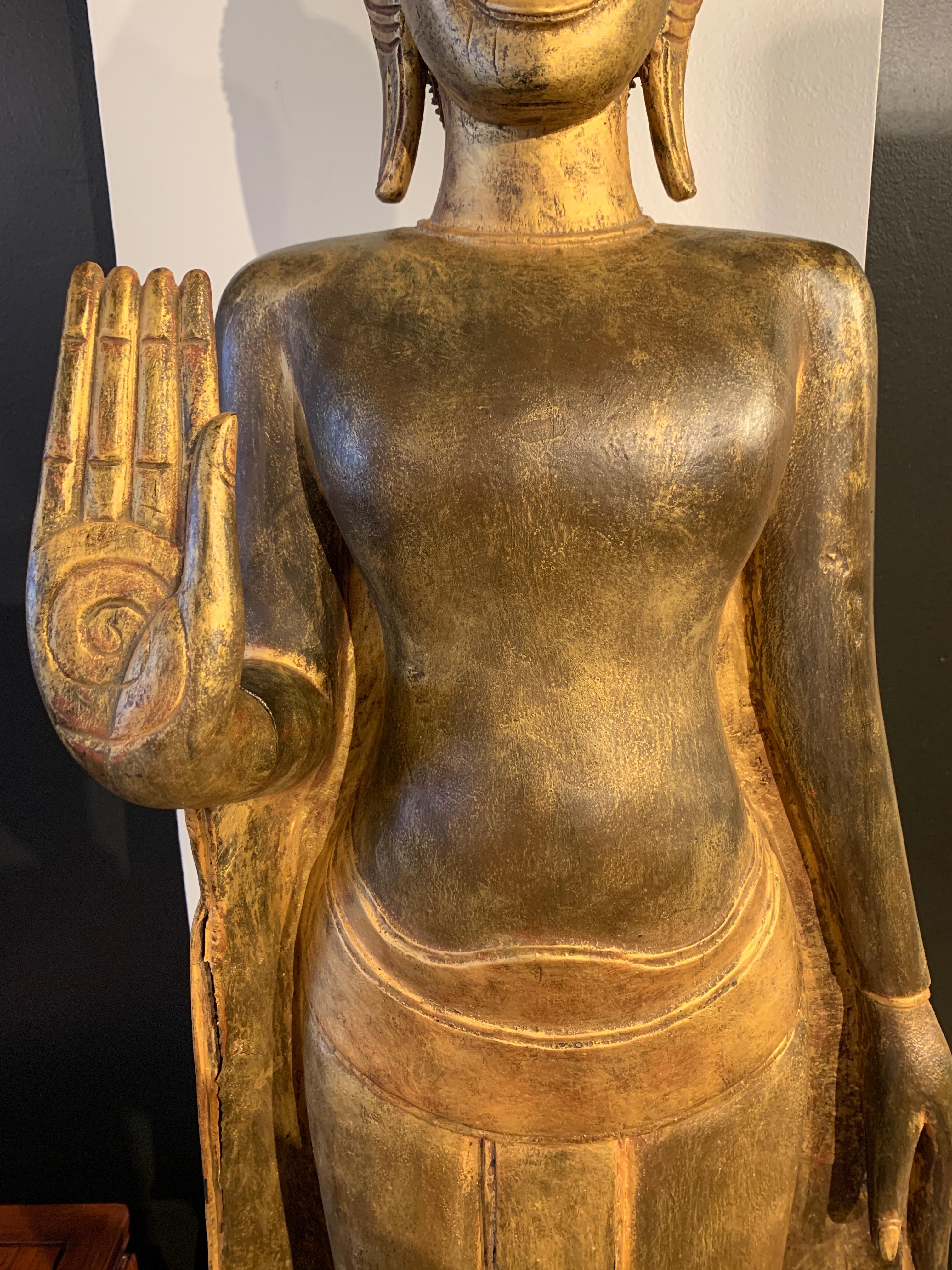 Large Carved Gilt Teak Standing Buddha, Northern Thailand, Early 20th Century For Sale 4