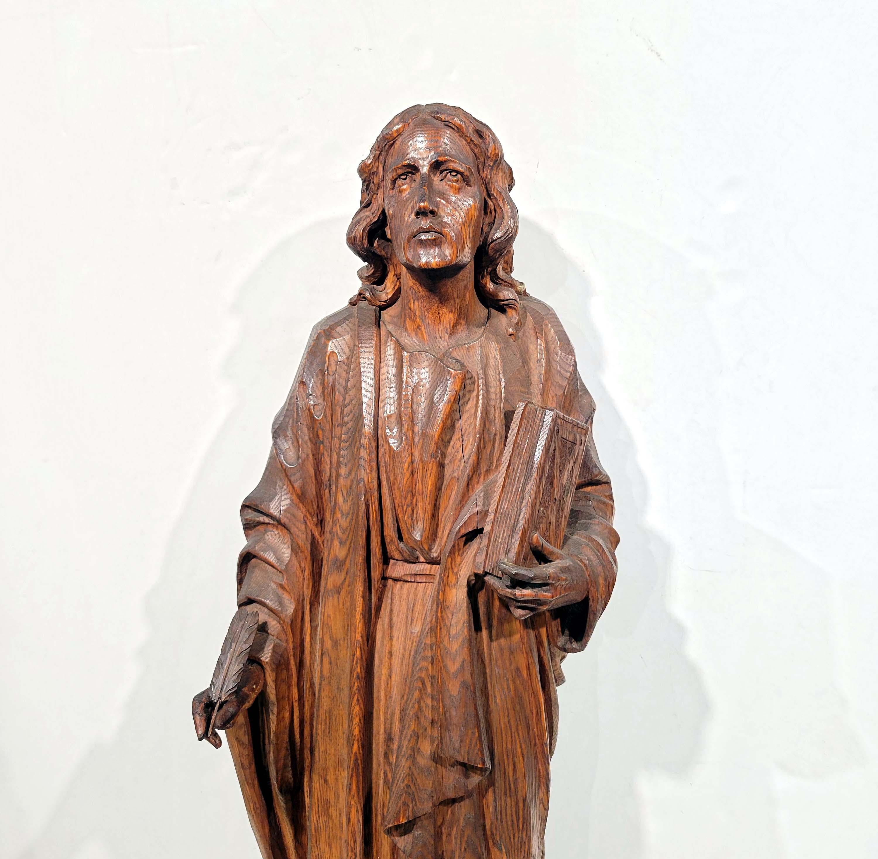A beautiful large carved oak figure of Saint John Evangelist with a feather pen in one hand, a book in the other hand and an eagle at his right foot.
Great solid carving, Possibly German, 19th century.
Great age patina and in good condition with