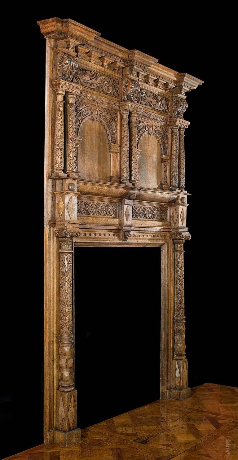 Large Carved Oak Jacobean Fireplace Surround and Overmantel For Sale at