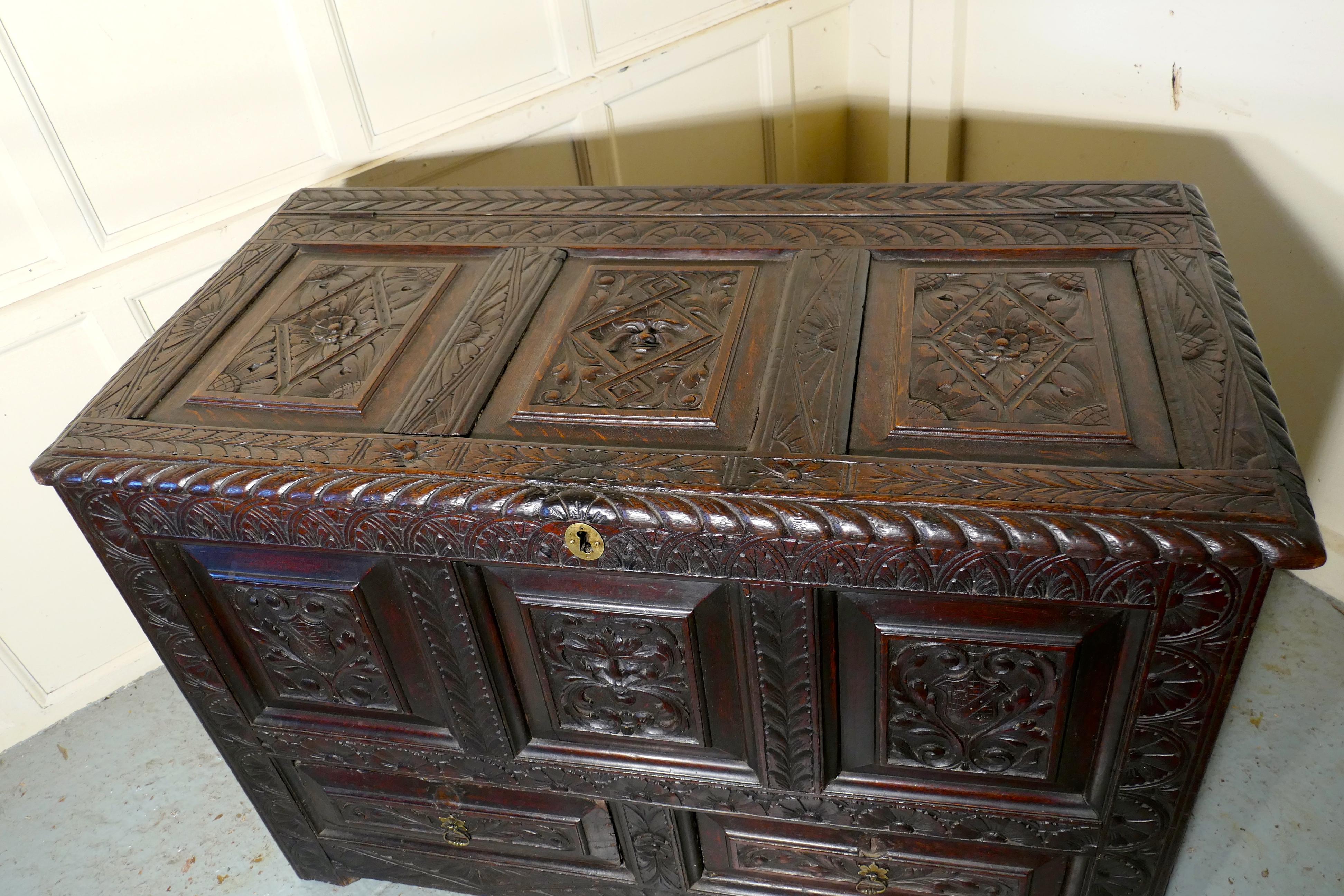 18th Century and Earlier Large Carved Oak Mule Chest, Green Man Marriage Chest    For Sale