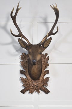 Large carved polychrome decorated stags head
