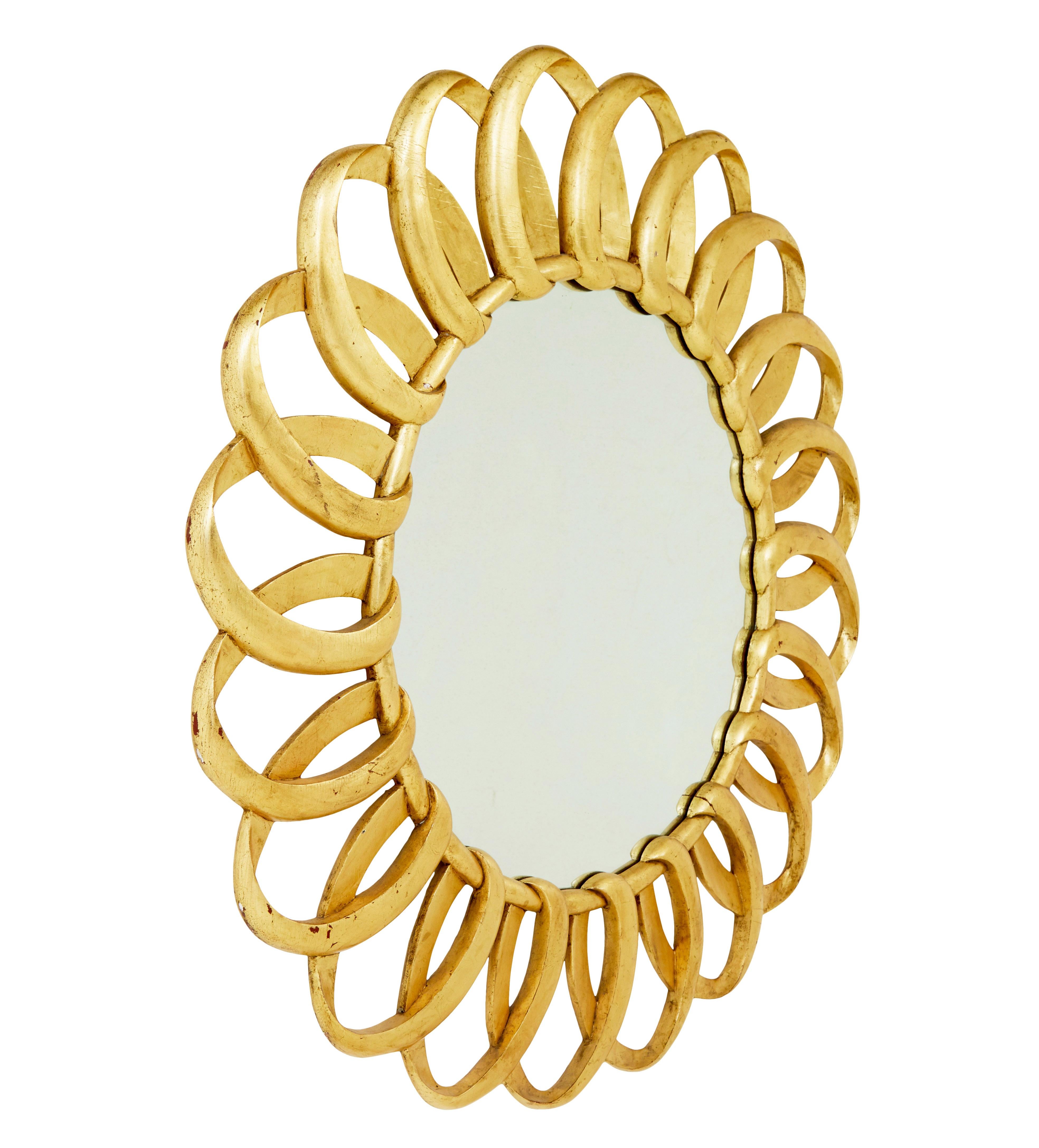 English Large carved rococo influenced gilt wall mirror For Sale