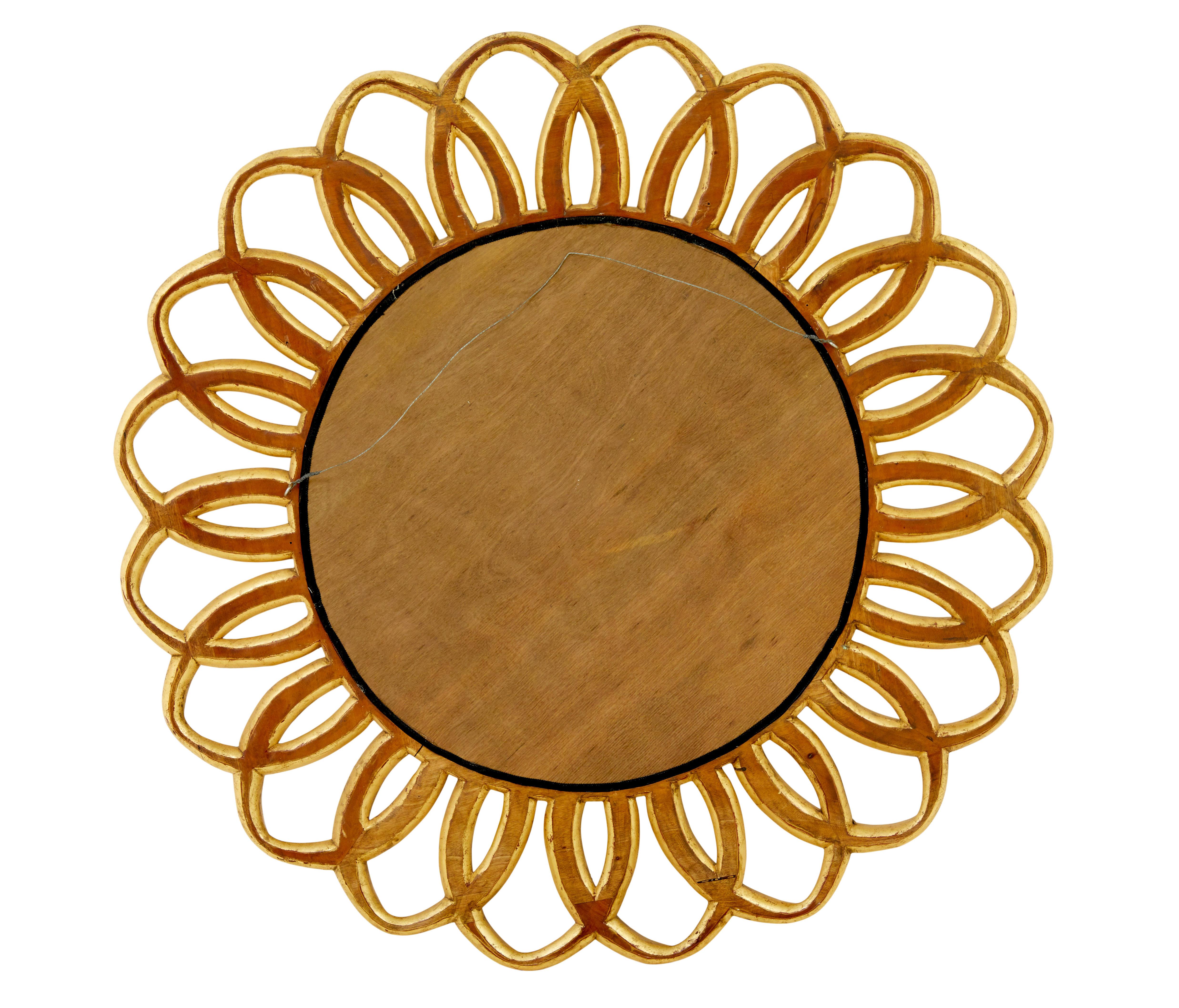 Hand-Carved Large carved rococo influenced gilt wall mirror For Sale