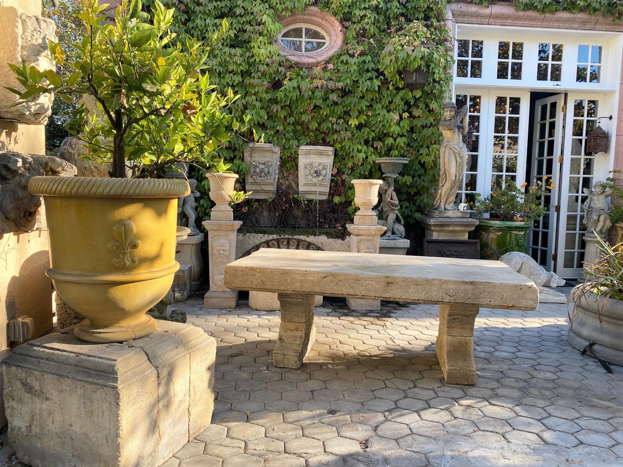 carved stone table