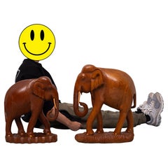 Large Carved Teak Elephant Statues Together with a Smaller Elephant  1950s